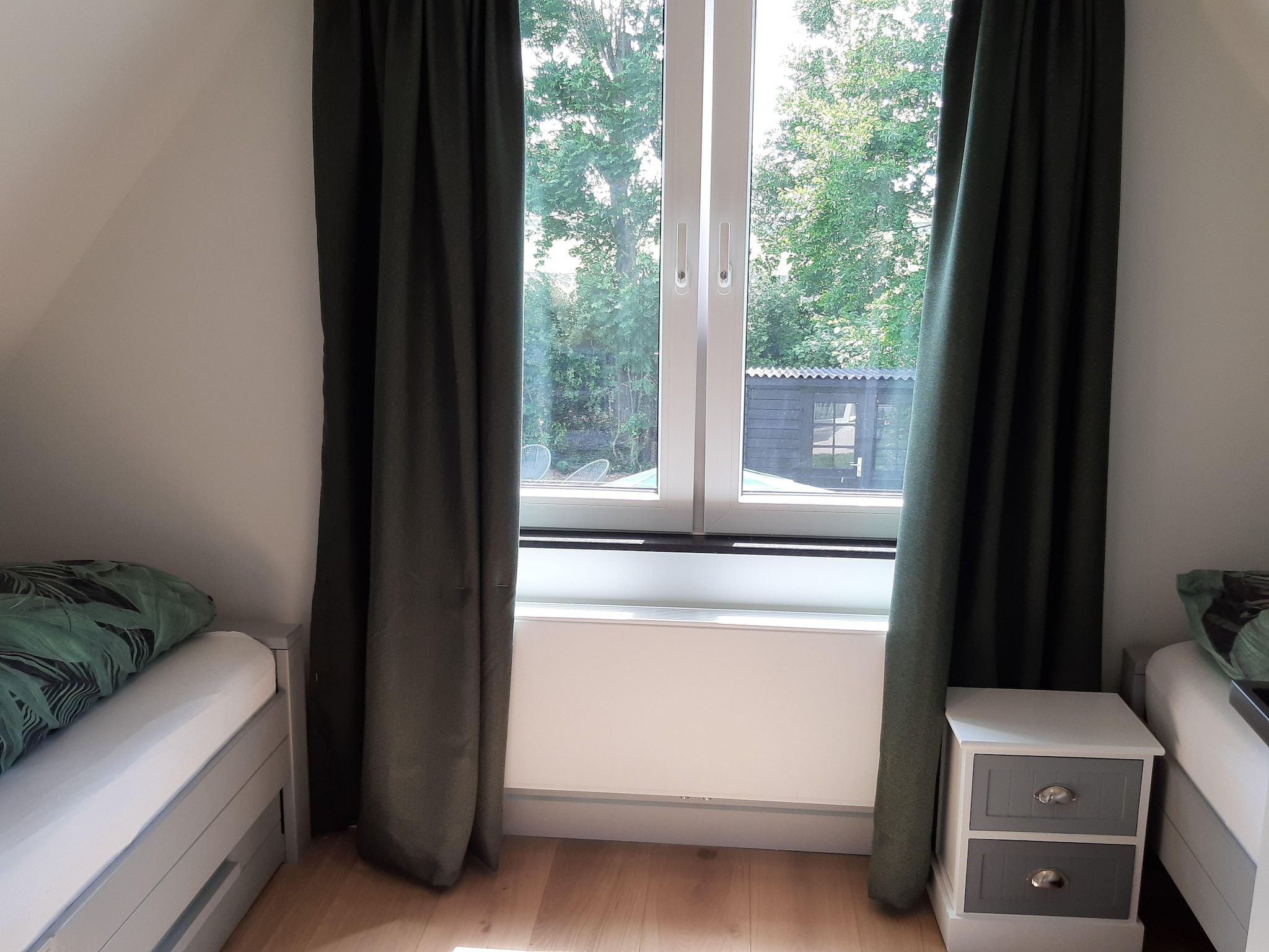 Een slaapkamer van Vakantiehuis DJEZ in Tuitjenhorn