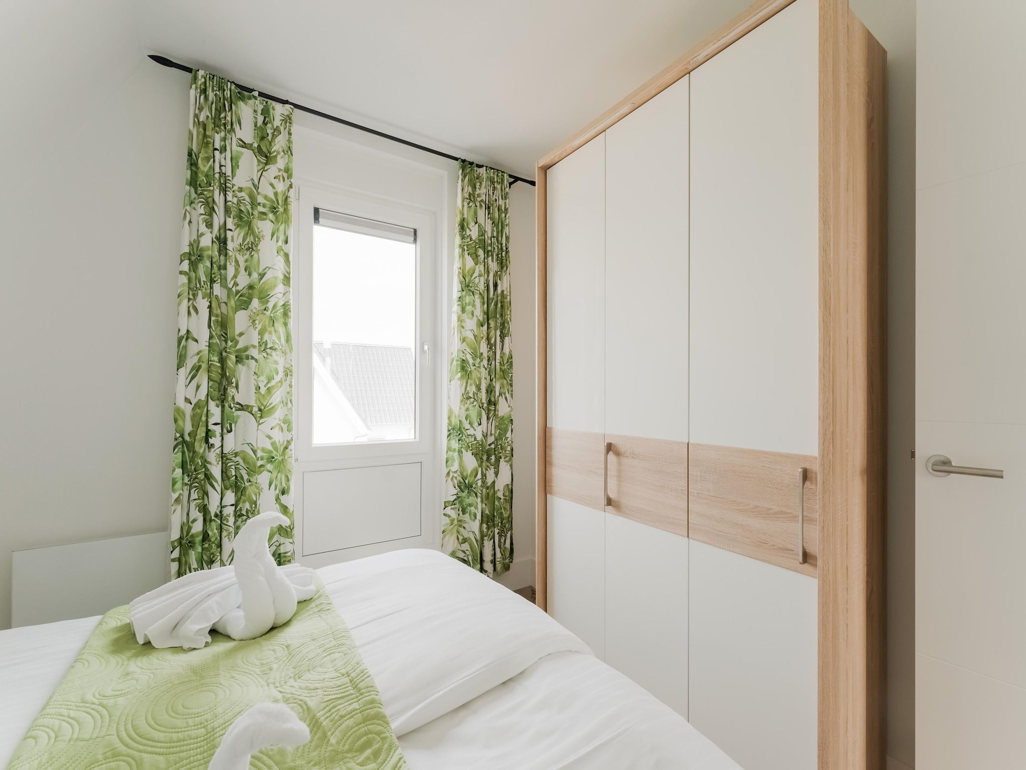 Een slaapkamer van Luxe villa aan het water in Stavoren