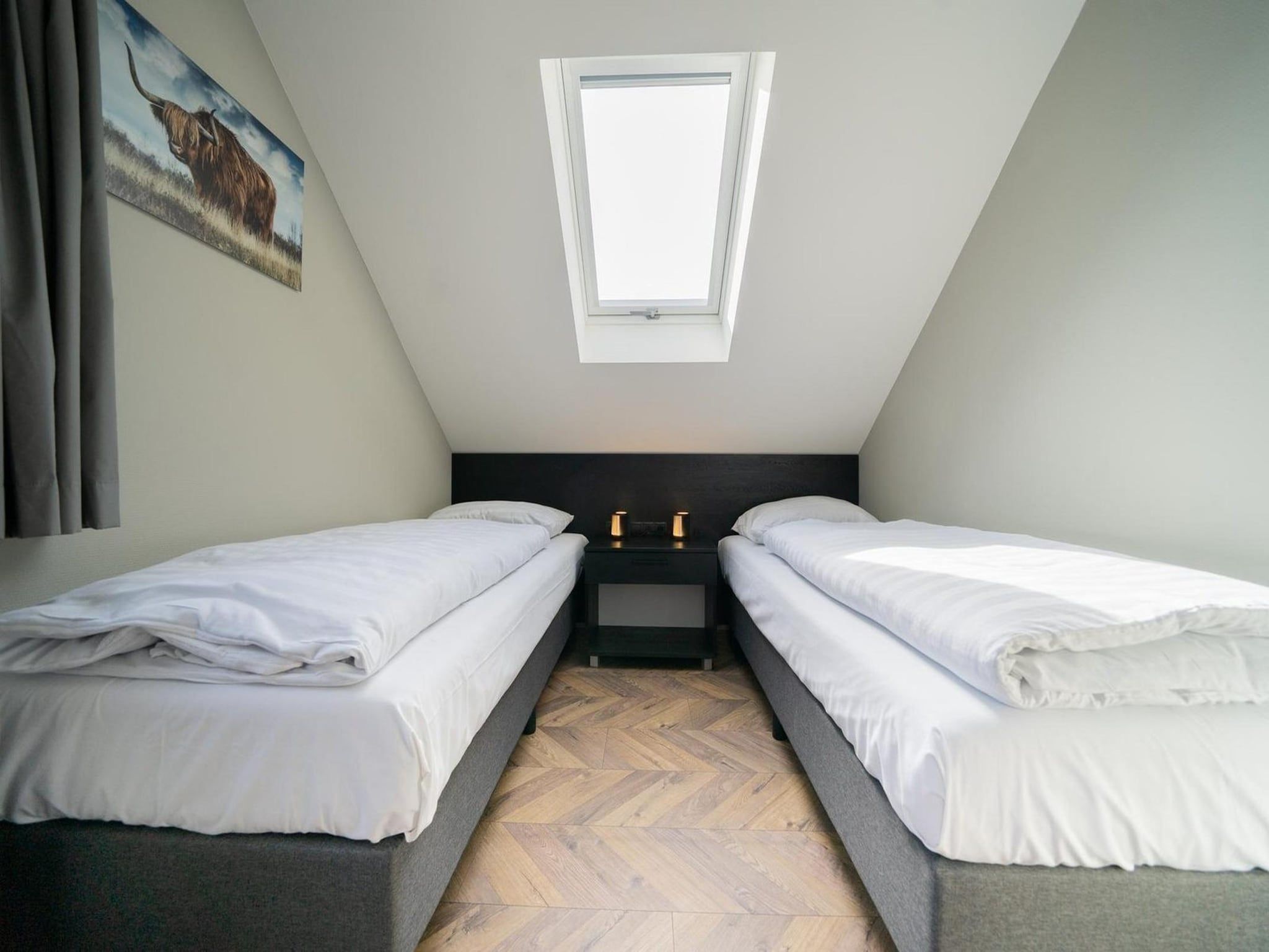 Een slaapkamer van Resort De IJssel Eilanden 8 in Kampen