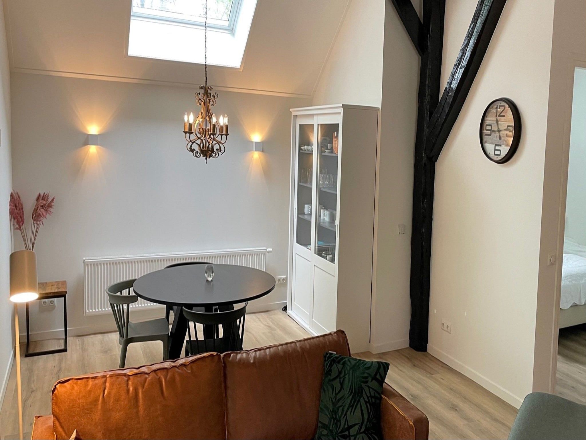 De woonkamer van Vakantiepark de Tabaksschuur 4 in Elst