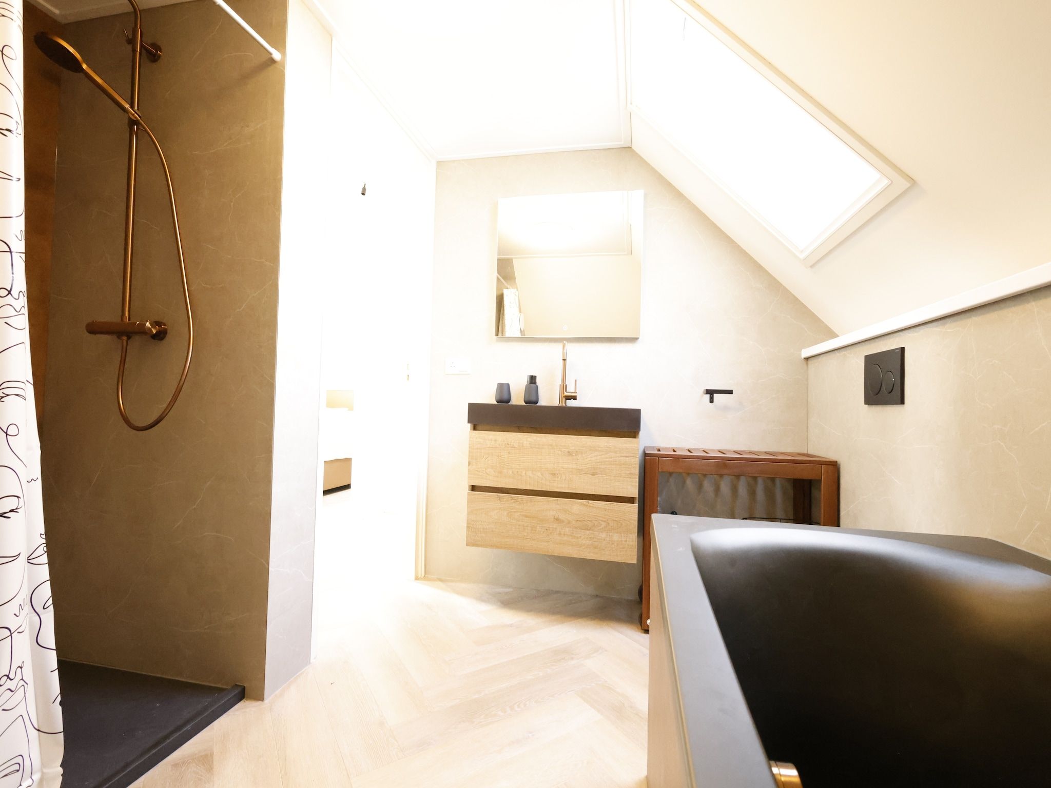 De badkamer van Recreatiepark Wiringherlant - Wiringher Villa 23 in Hippolytushoef