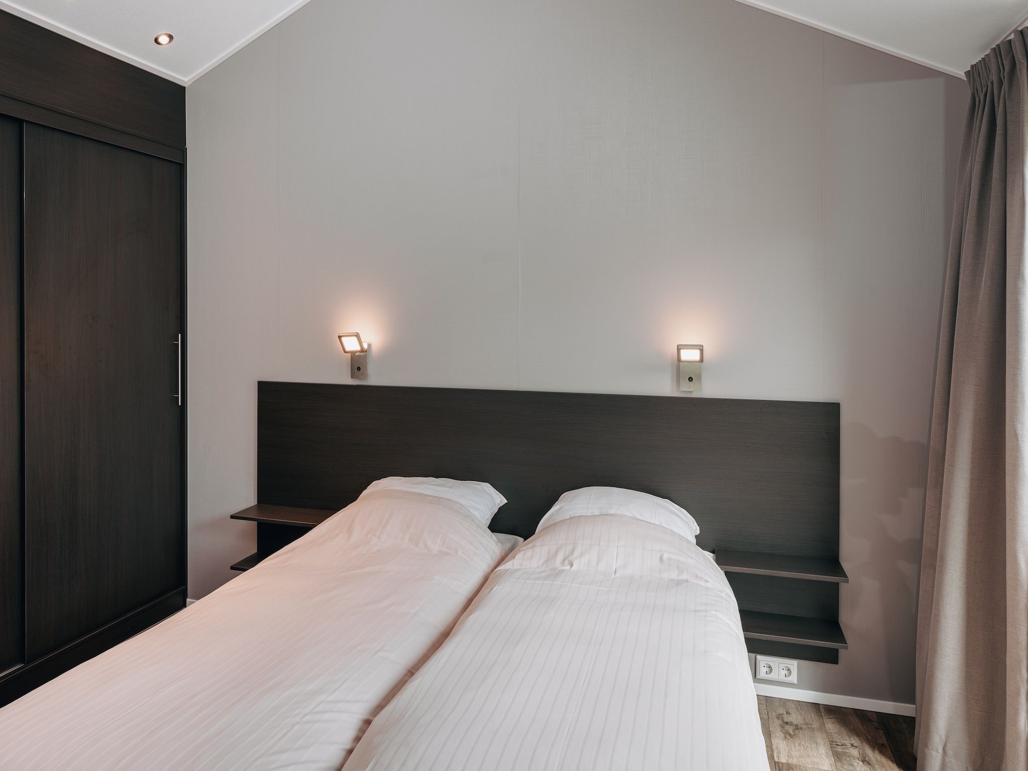 Een slaapkamer van Vakantiepark Giethoorn 8 in Giethoorn