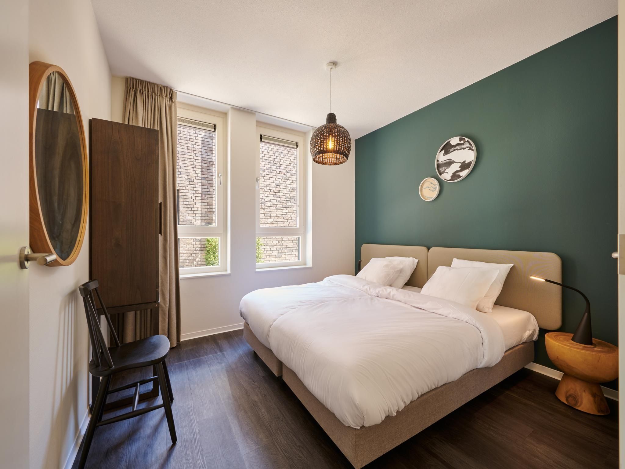 Een slaapkamer van Resort Maastricht 33 in Maastricht