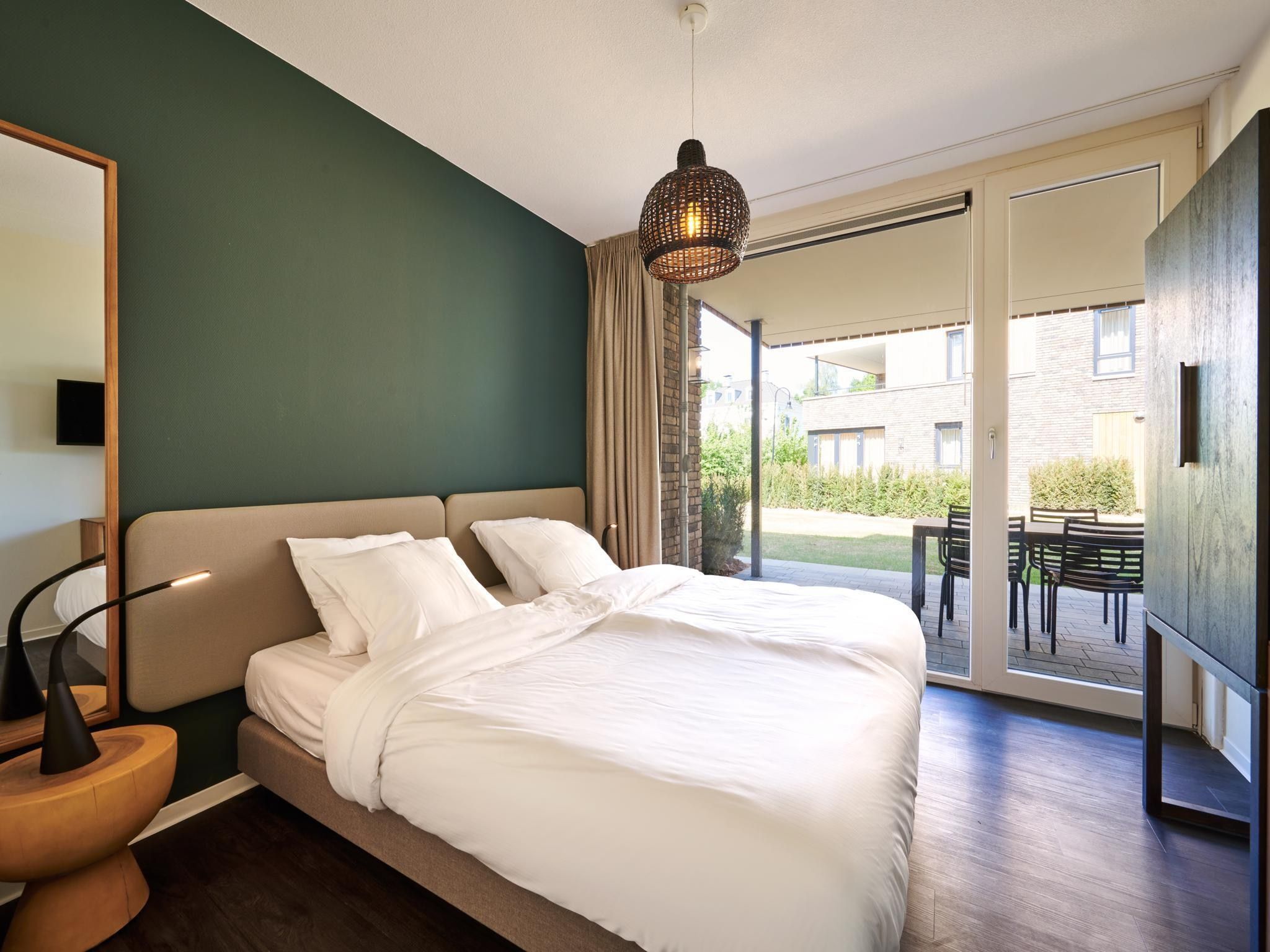 Een slaapkamer van Resort Maastricht 33 in Maastricht