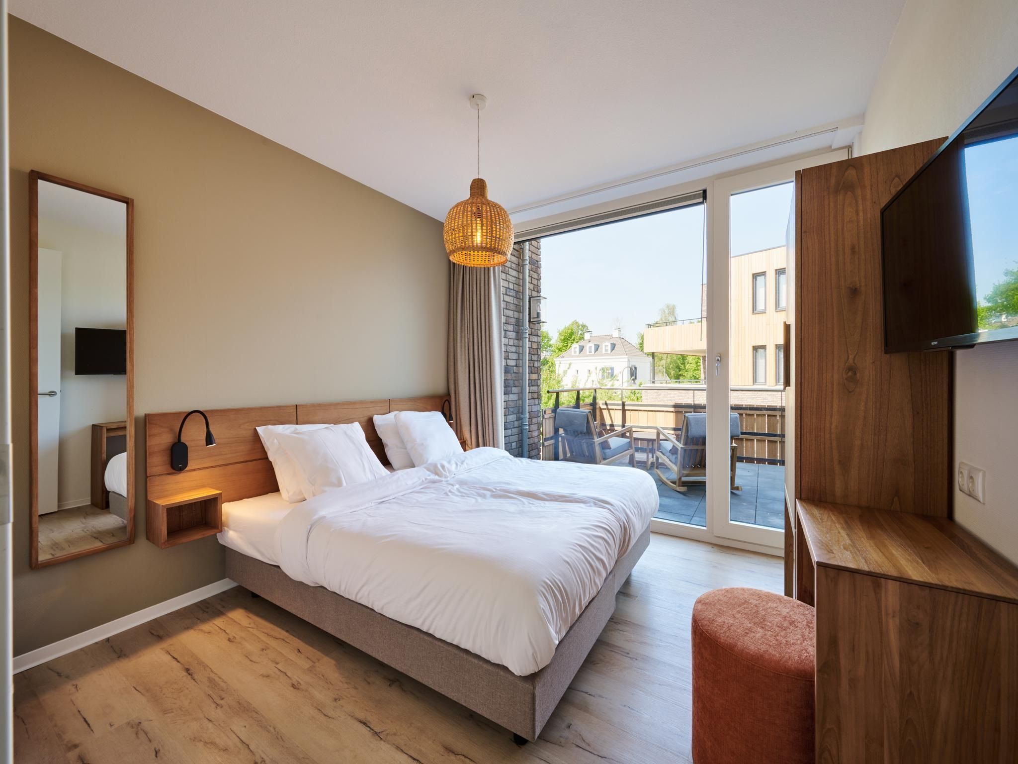 Een slaapkamer van Resort Maastricht 33 in Maastricht