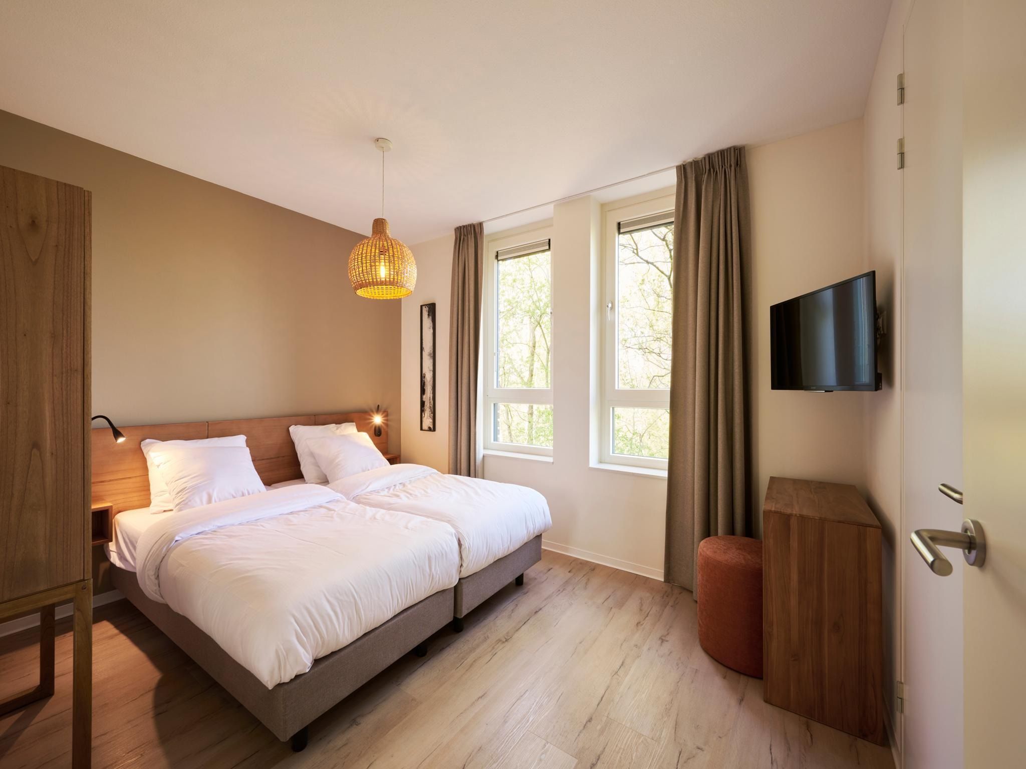 Een slaapkamer van Resort Maastricht 35 in Maastricht
