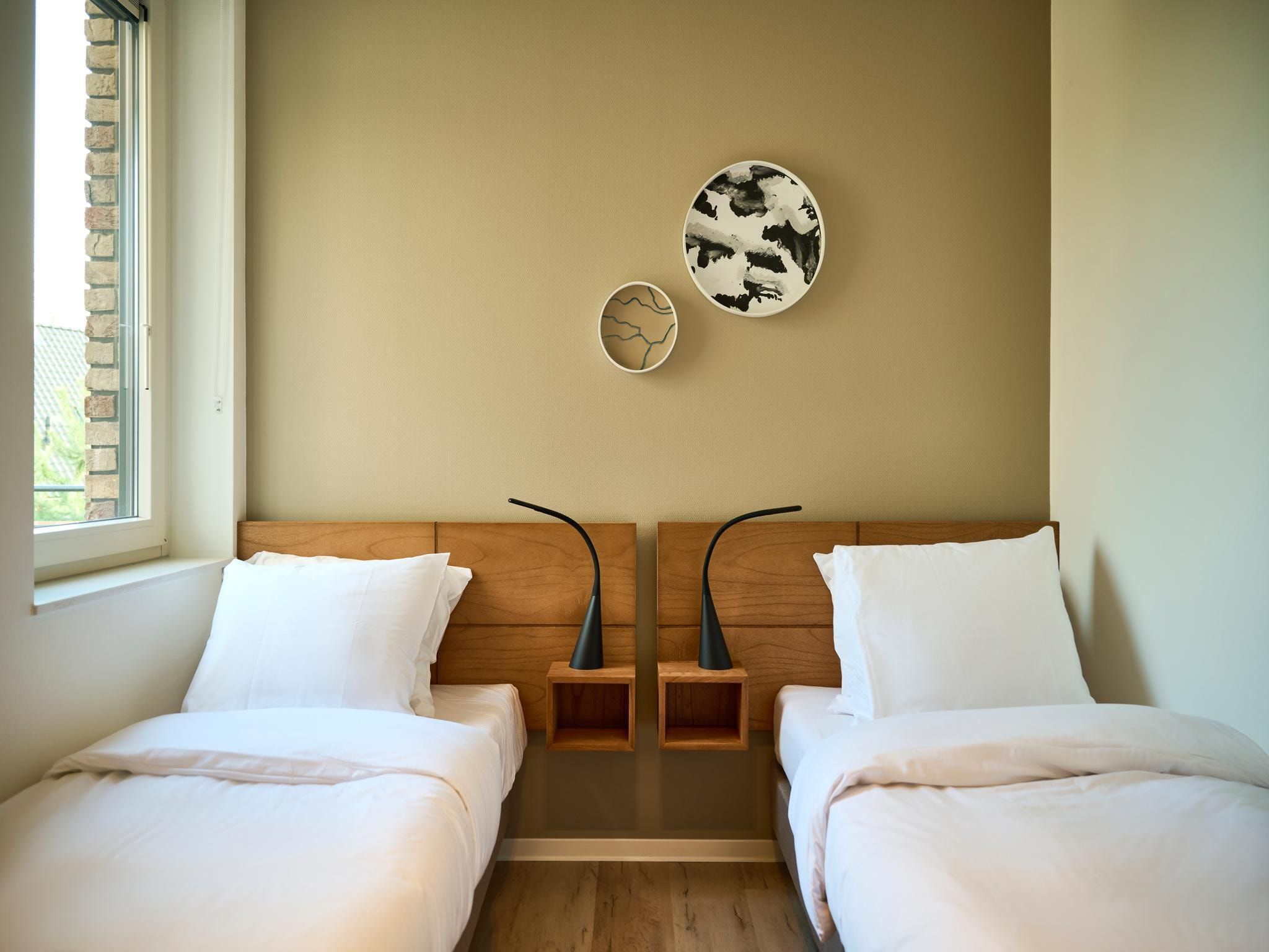 Een slaapkamer van Resort Maastricht 35 in Maastricht