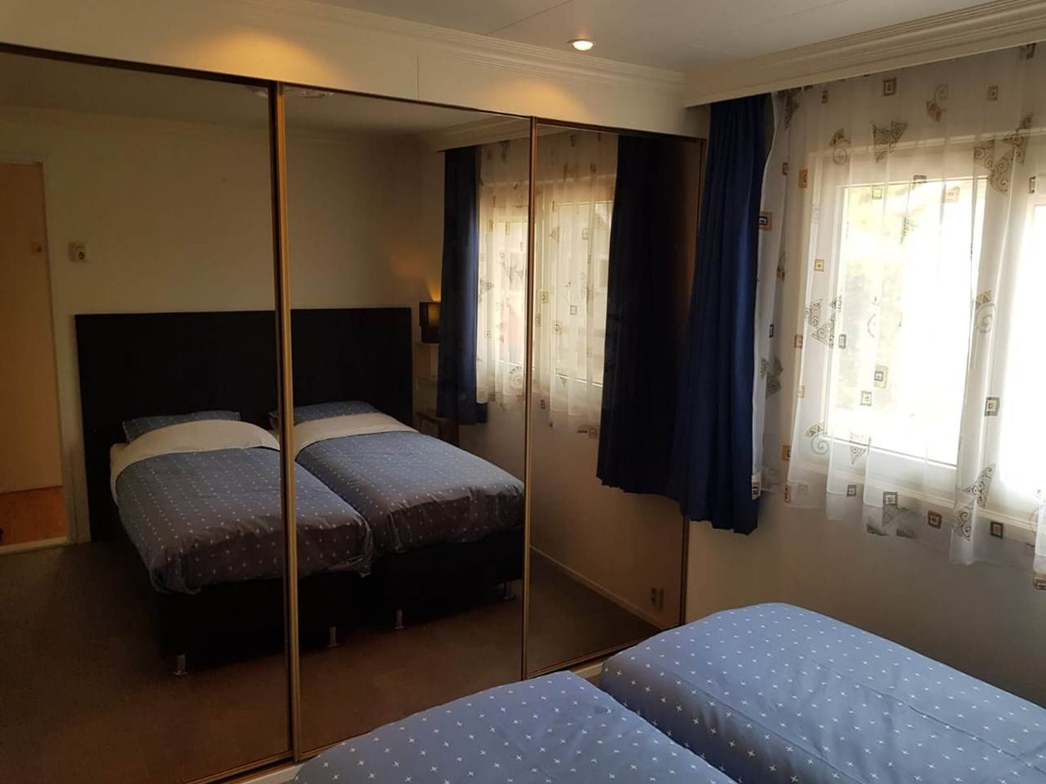 Een slaapkamer van Koperwiek in Garderen