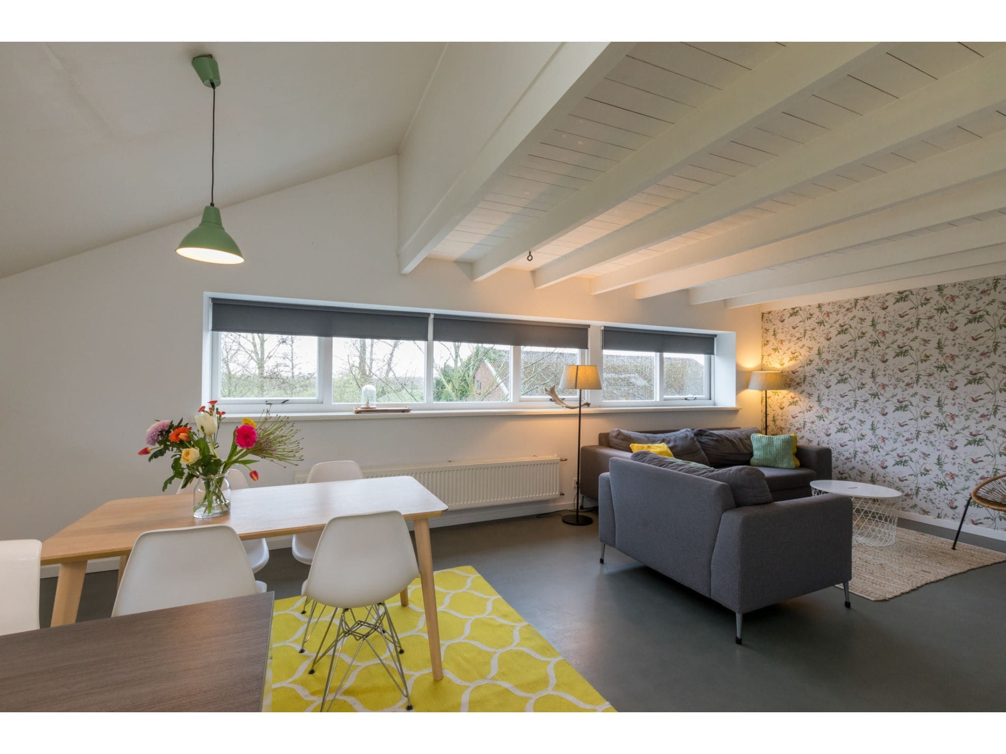 De woonkamer van Appartement - Kon Emmaweg 6  Vrouwenpolder bovenapp in Vrouwenpolder