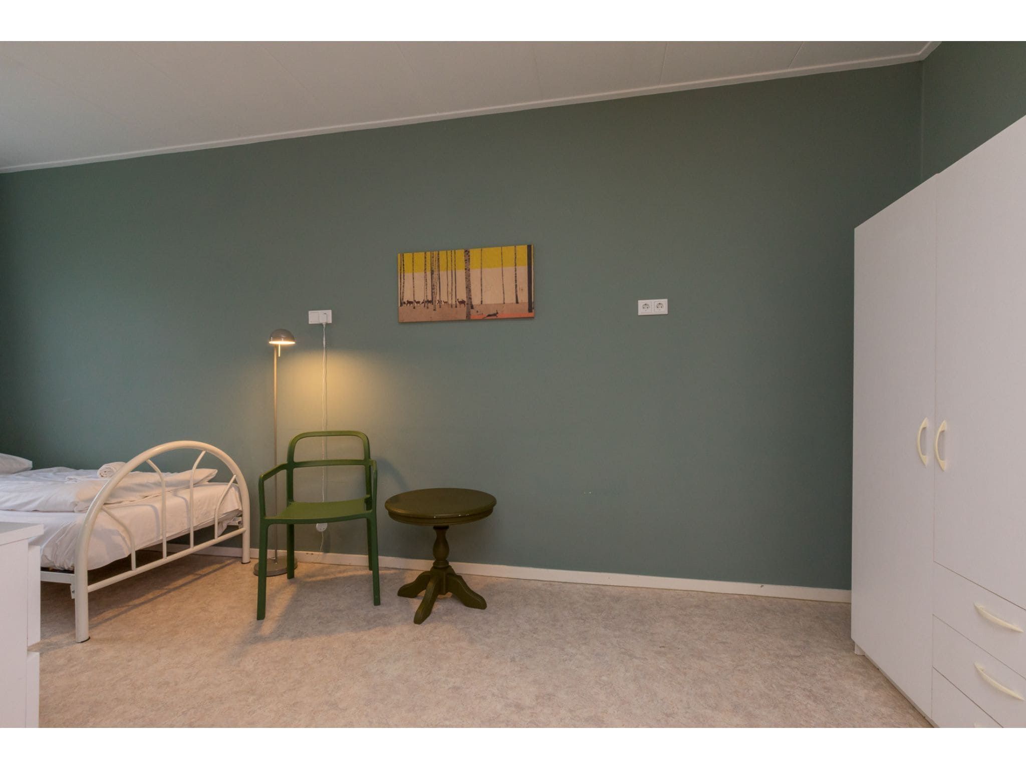 Een slaapkamer van Appartement - Kon Emmaweg 6  beneden app in Vrouwenpolder