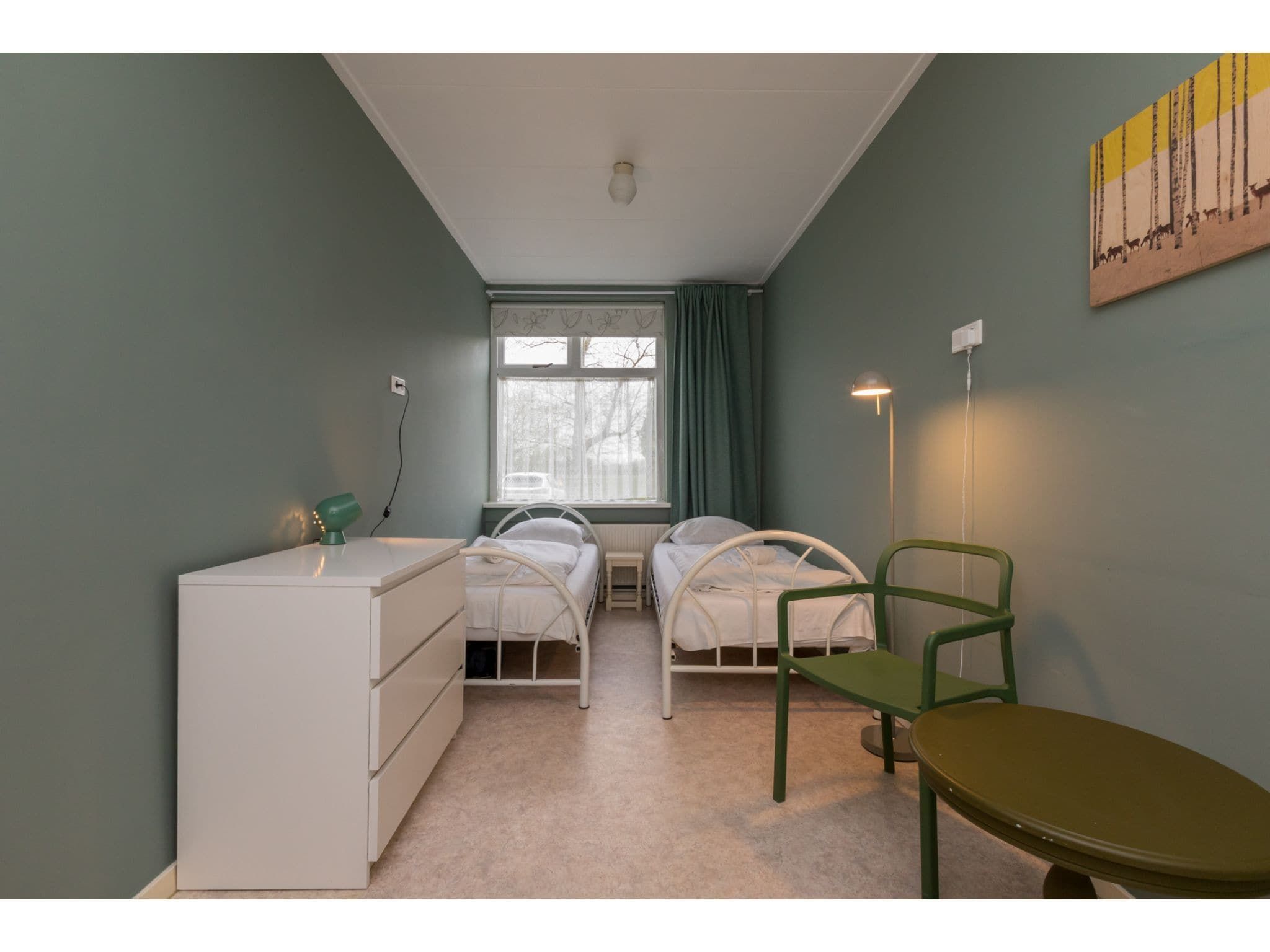 Een slaapkamer van Appartement - Kon Emmaweg 6  beneden app in Vrouwenpolder