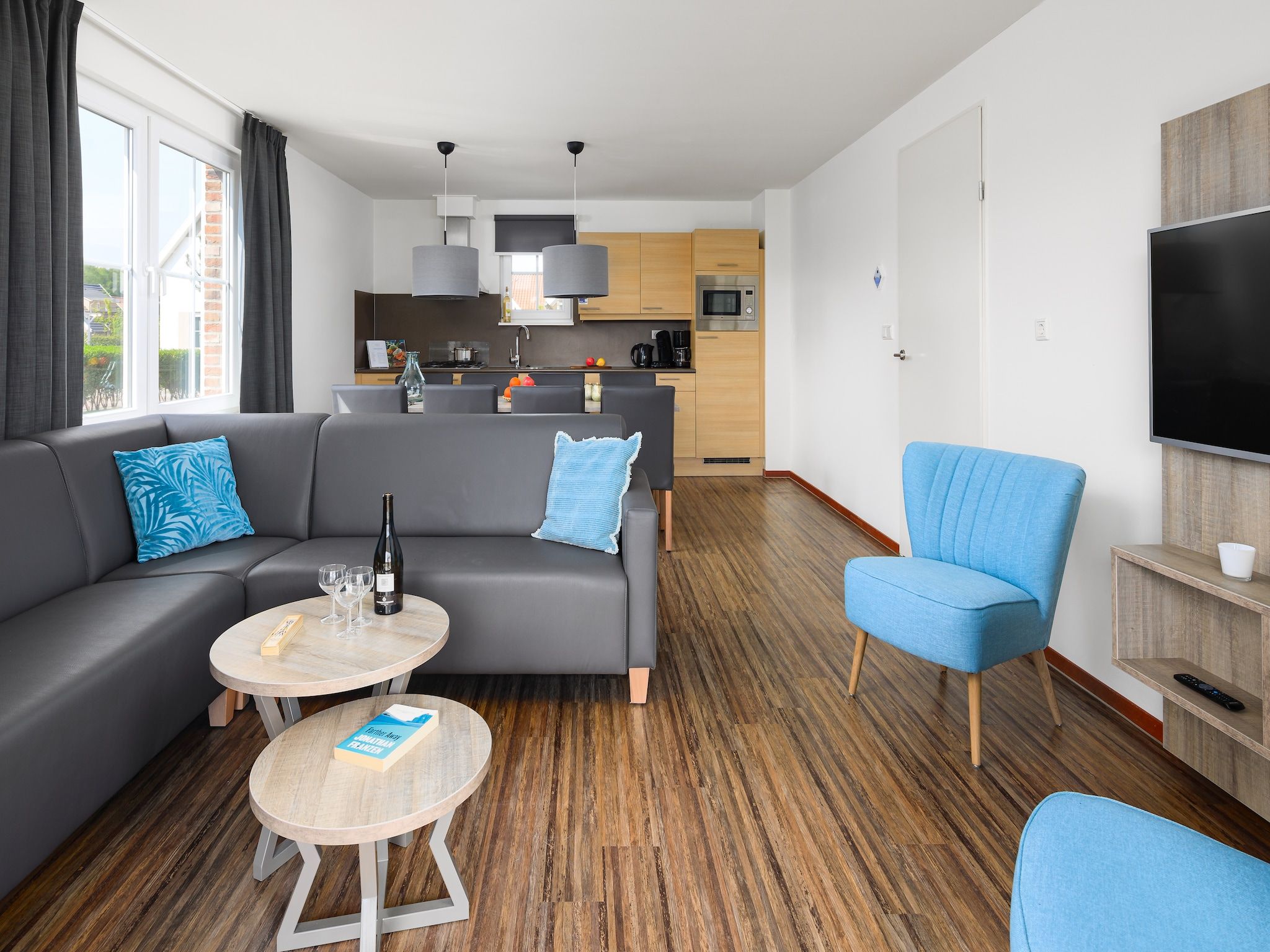 De woonkamer van Vakantiepark Klein Vink 9 in Arcen