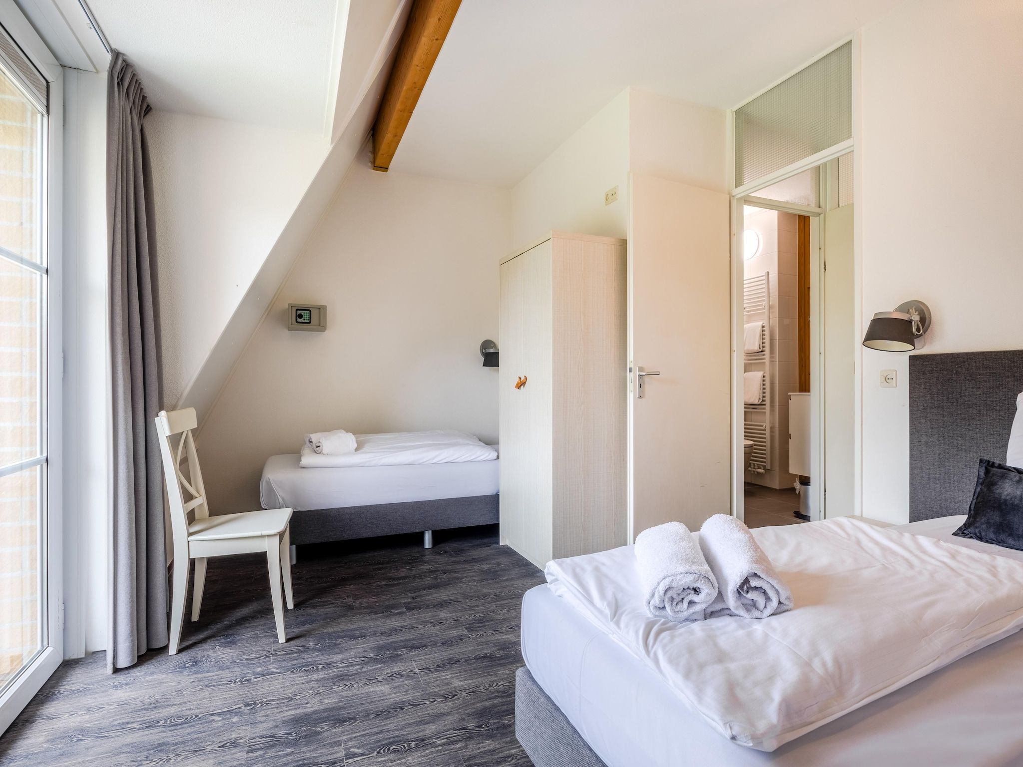 Een slaapkamer van Noordzee Résidence De Banjaard 21 in Kamperland