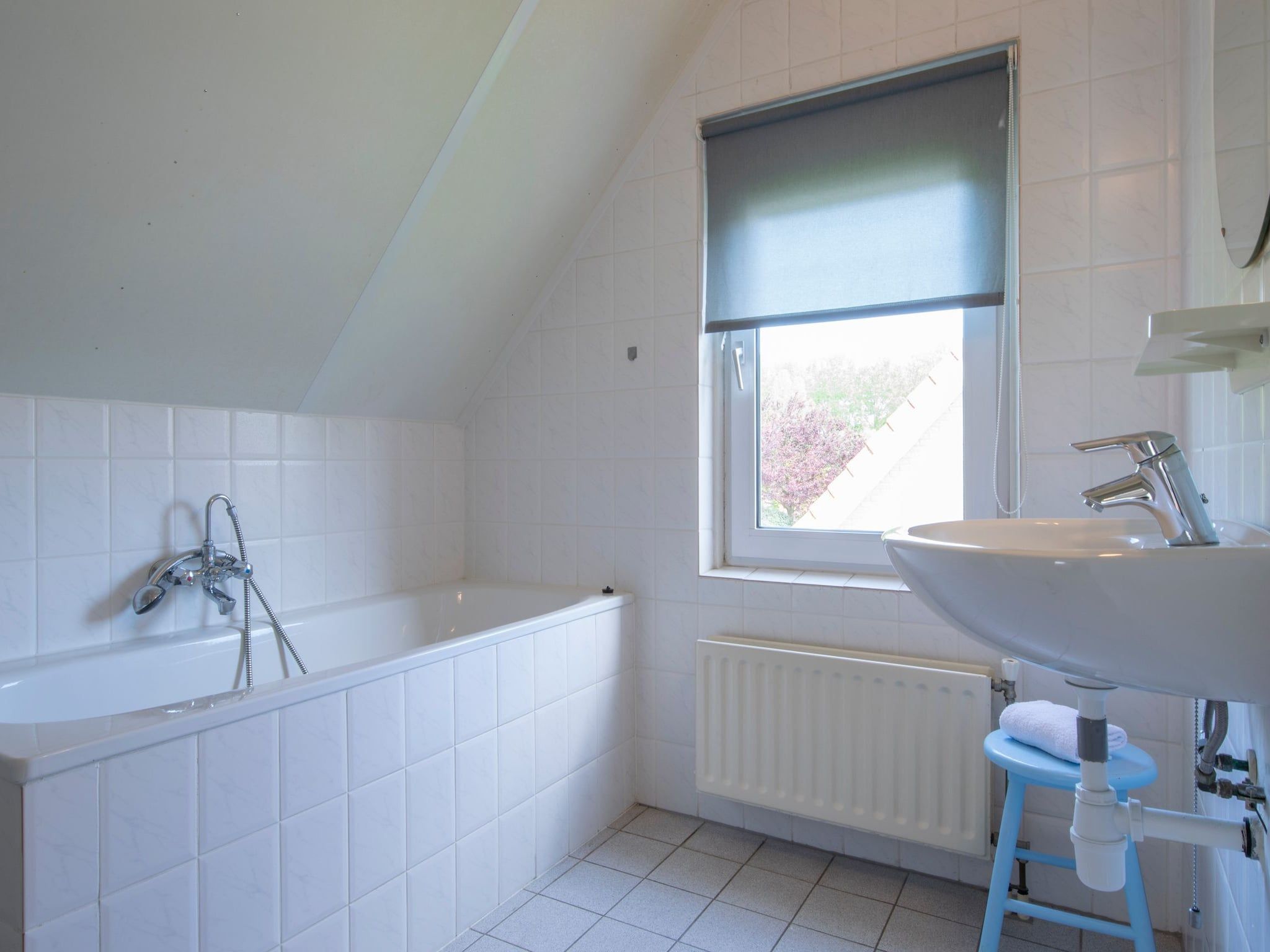 De badkamer van Vakantiepark Zeeland Village 3 in Scharendijke