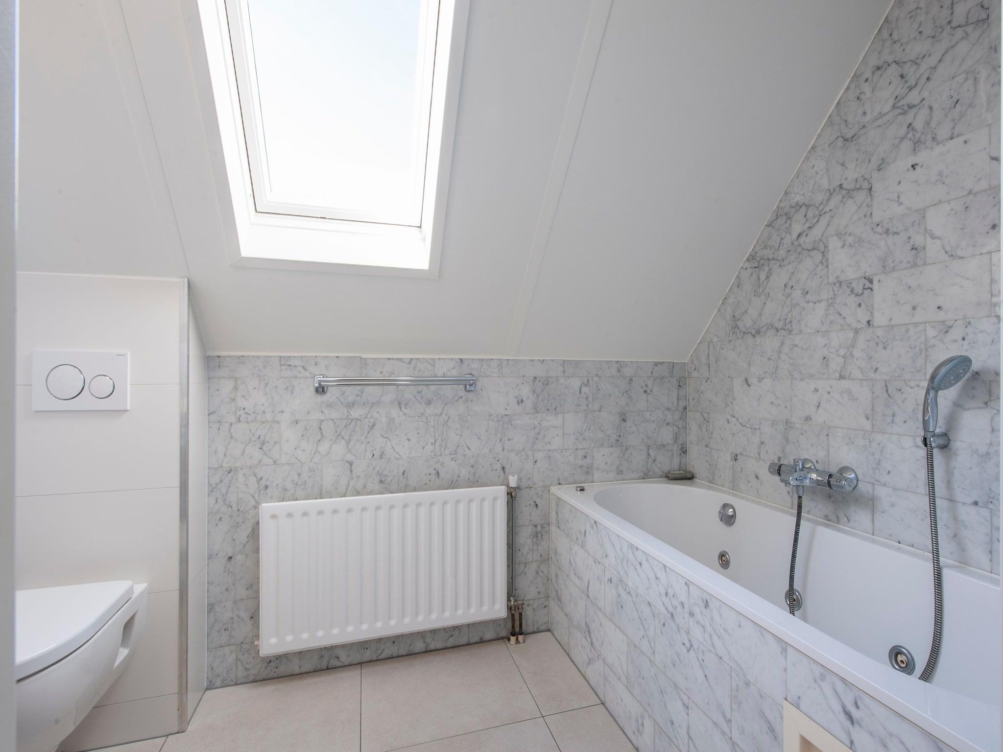 De badkamer van Vakantiepark Zeeland Village 4 in Scharendijke