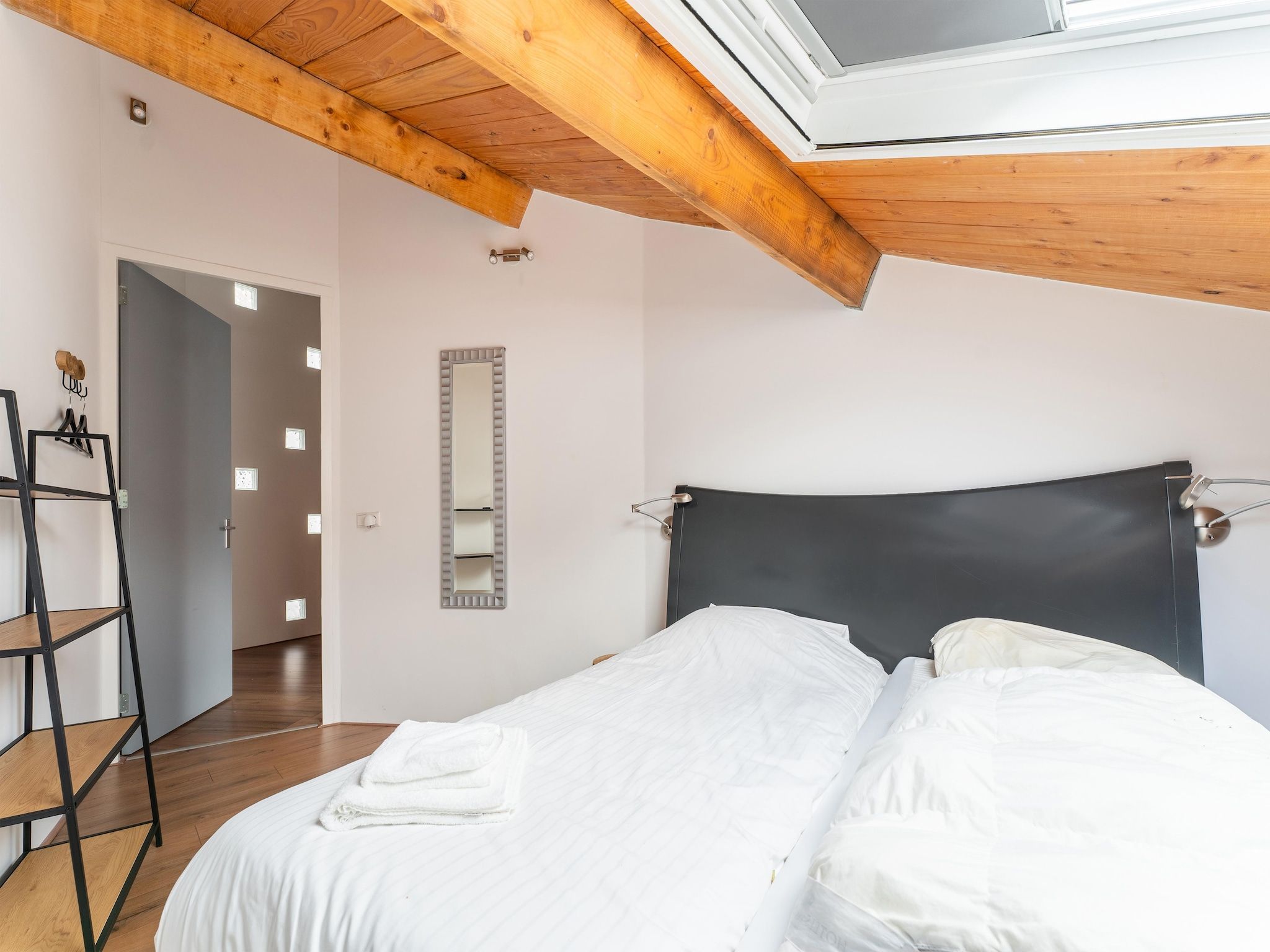 Een slaapkamer van NR 5 in Goirle