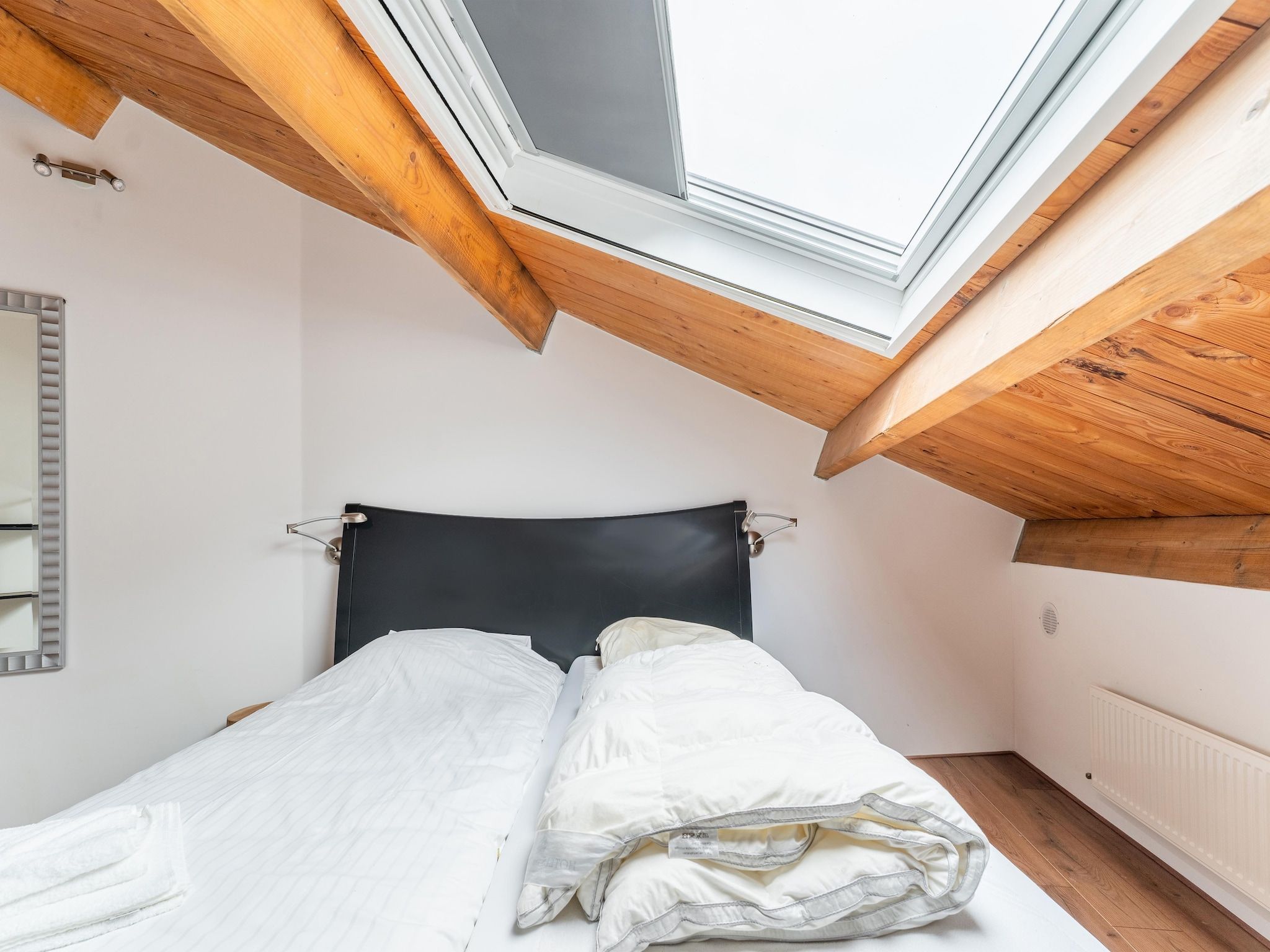 Een slaapkamer van NR 5 in Goirle