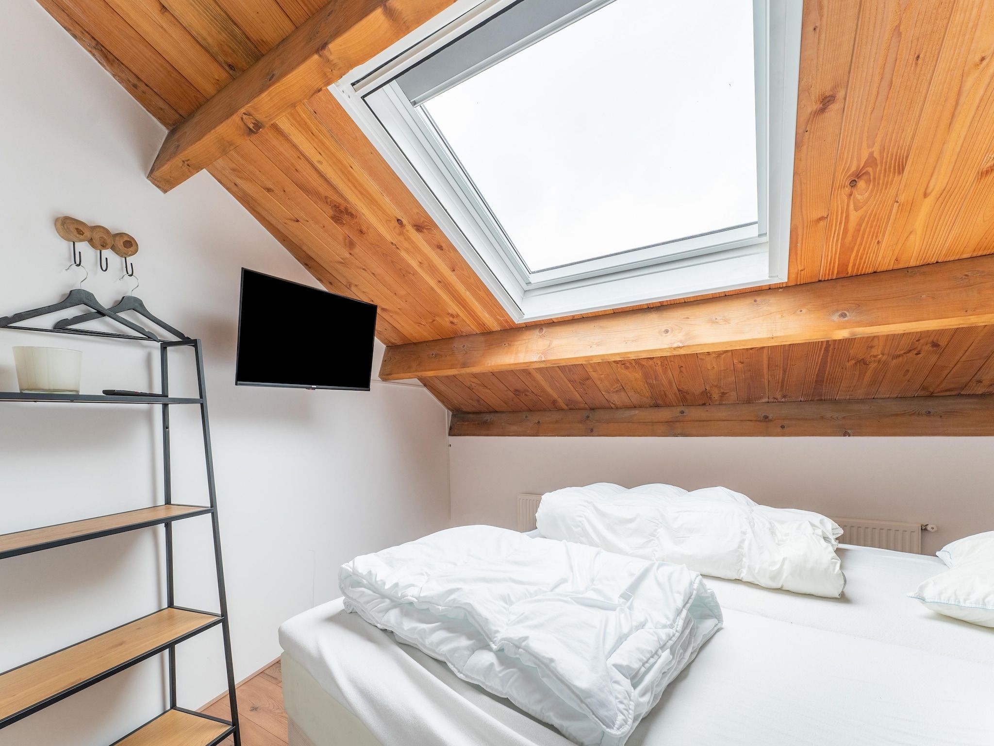 Een slaapkamer van NR 5 in Goirle