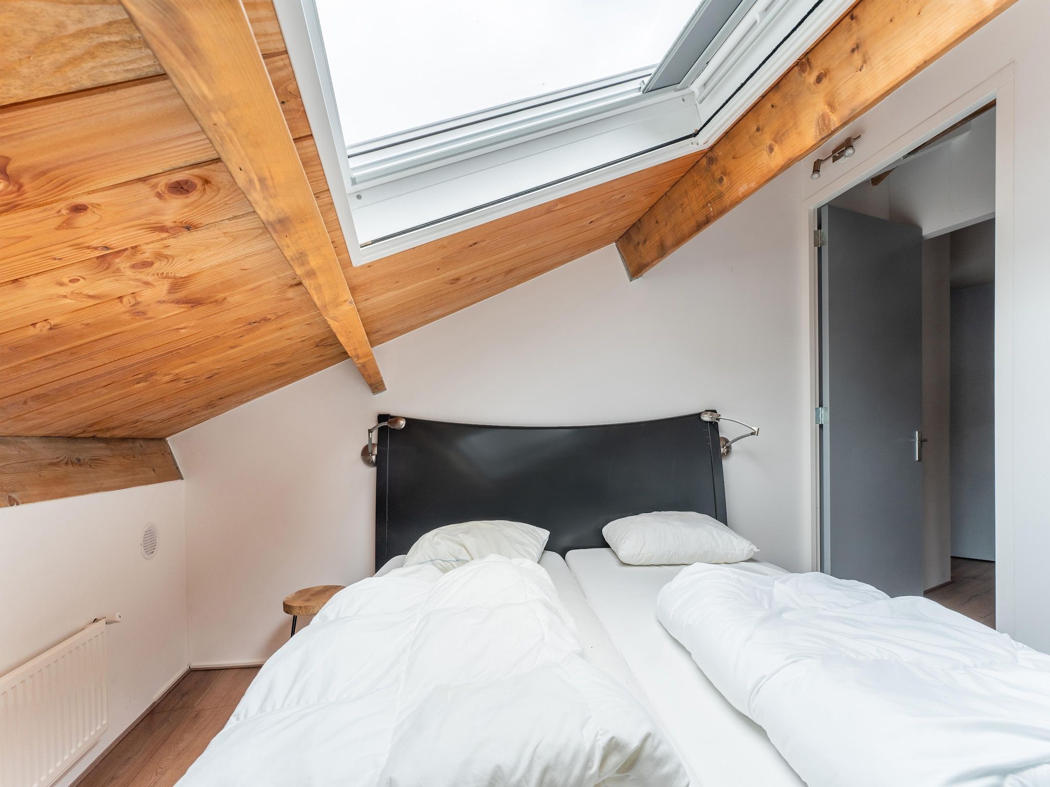 Een slaapkamer van NR 5 in Goirle