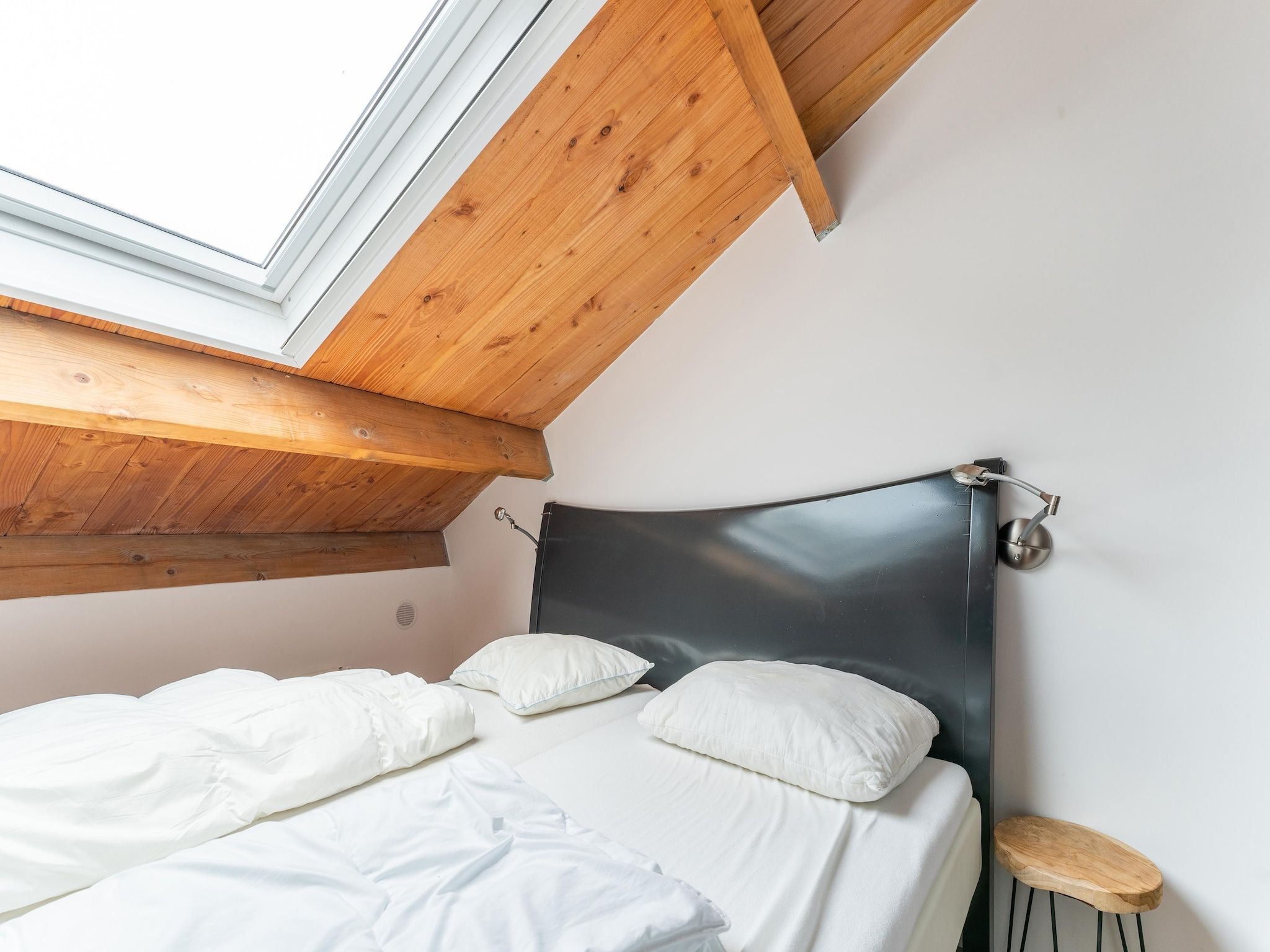 Een slaapkamer van NR 5 in Goirle