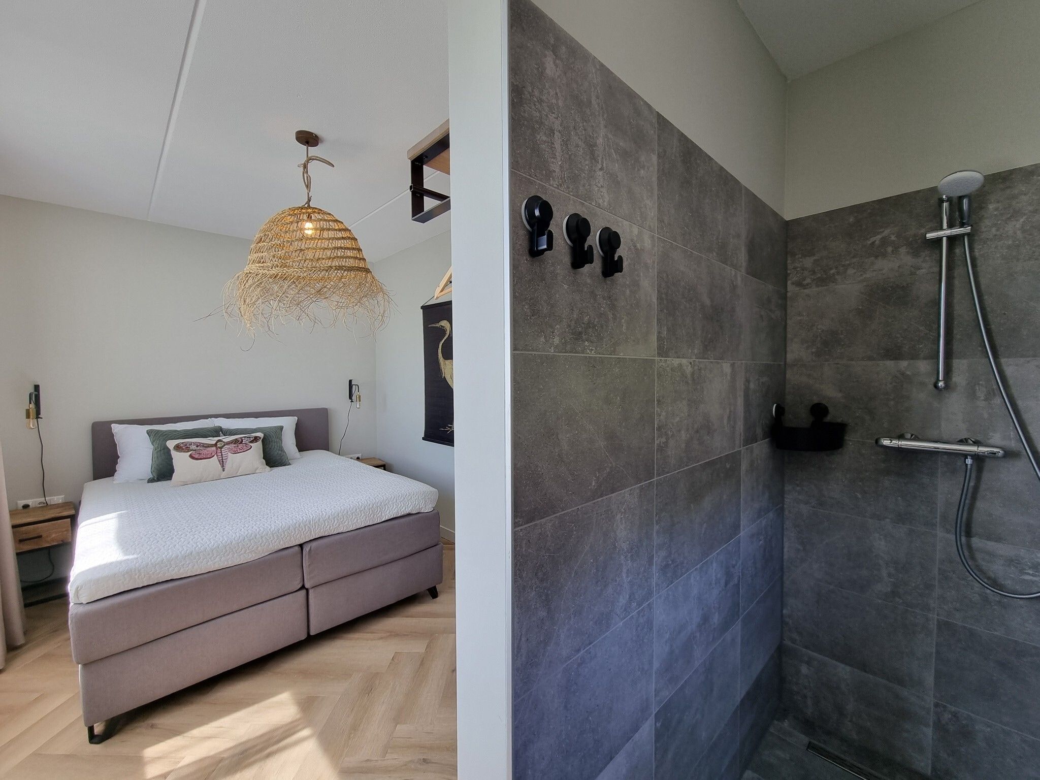 Een slaapkamer van Watervilla Tolve in Balk