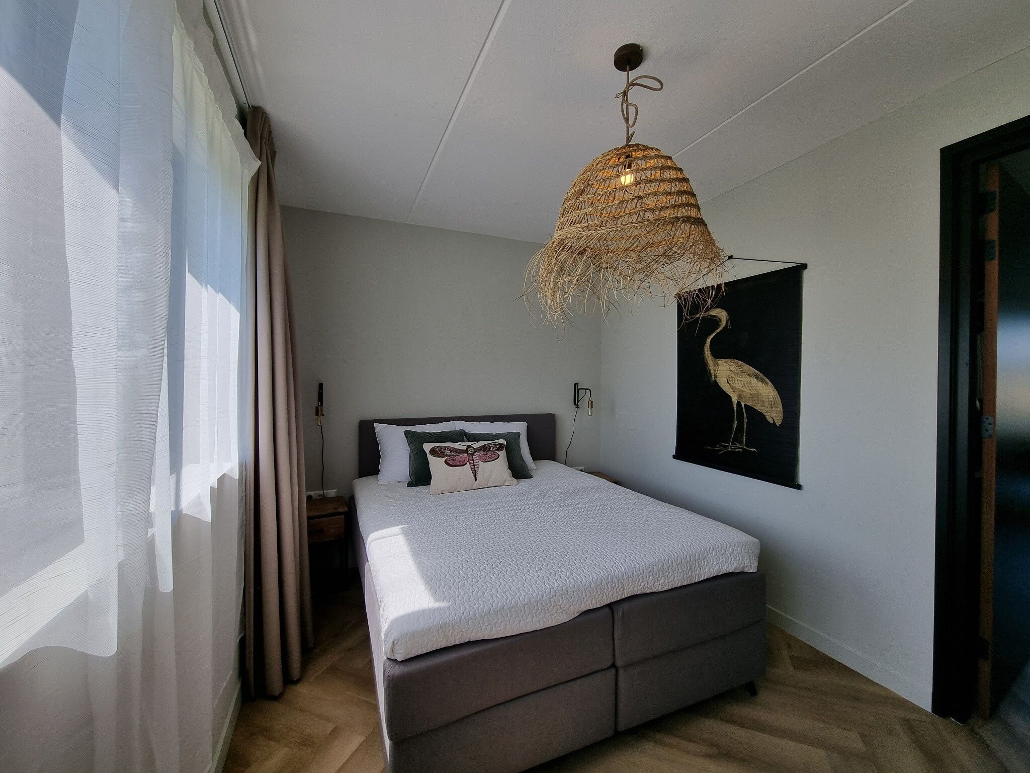 Een slaapkamer van Watervilla Tolve in Balk