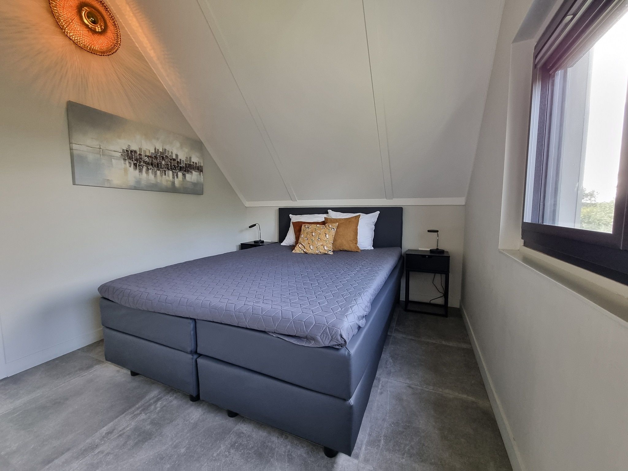 Een slaapkamer van Watervilla Fjirtjin in Balk