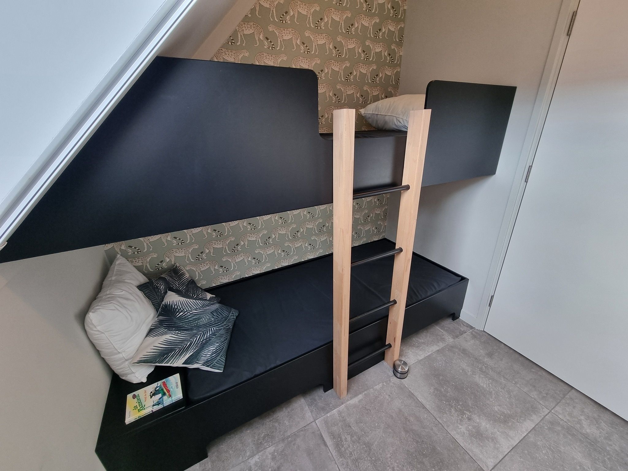 Een slaapkamer van Watervilla Ien in Balk