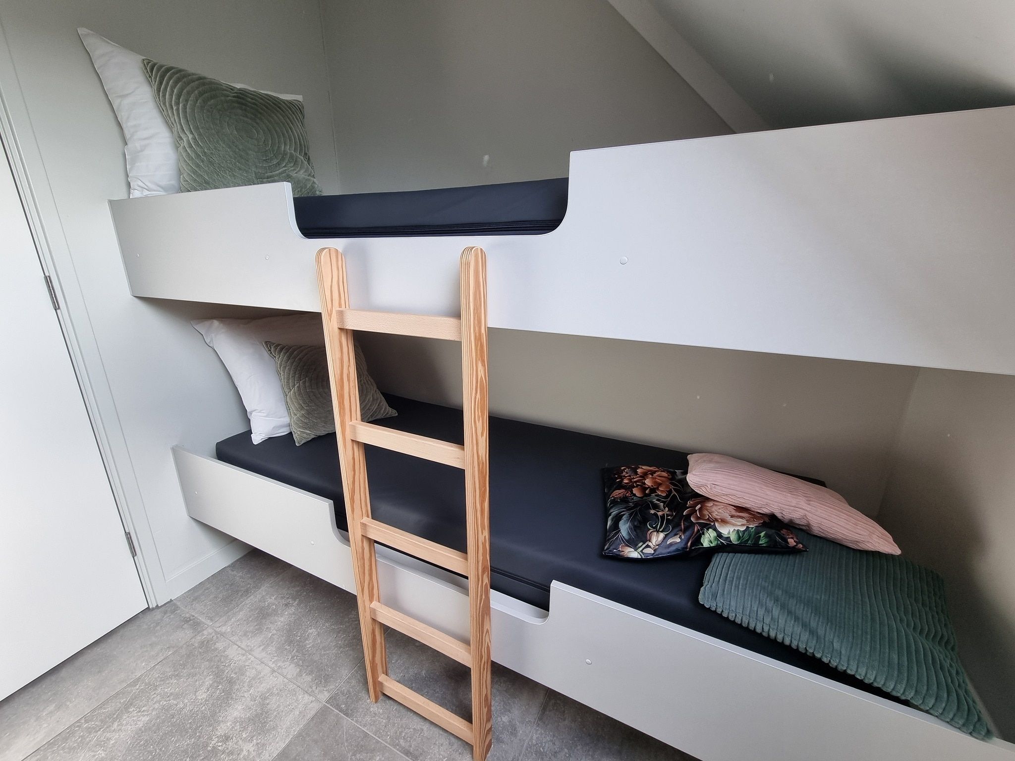 Een slaapkamer van Watervilla Tsien in Balk