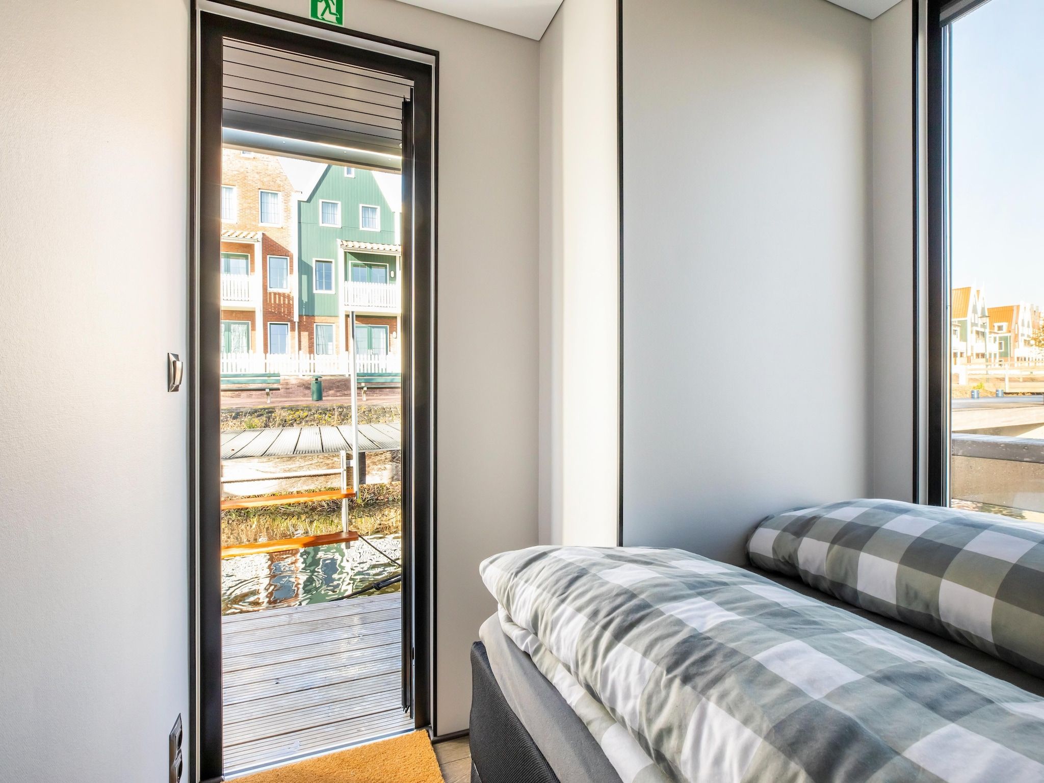 Een slaapkamer van Marina Sunrise in Volendam