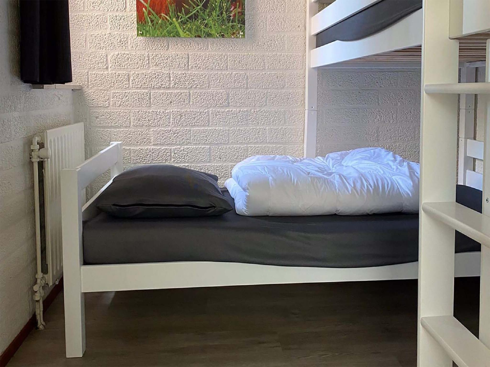 Een slaapkamer van Vakantiepark Weerterbergen 14 in Weert