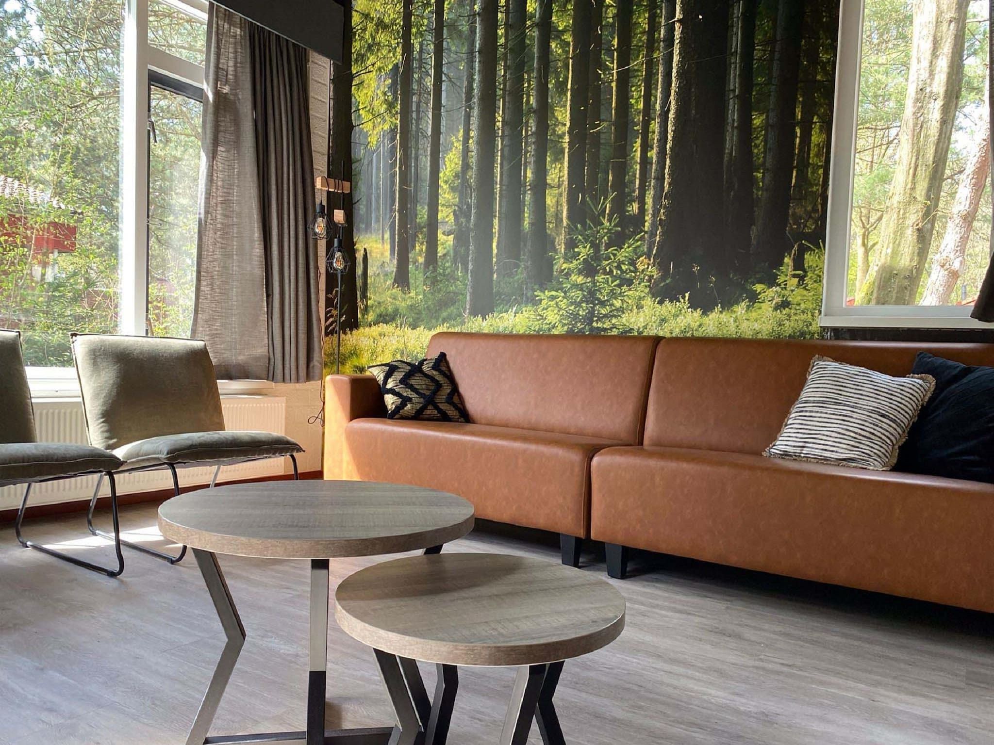 De woonkamer van Vakantiepark Weerterbergen 15 in Weert