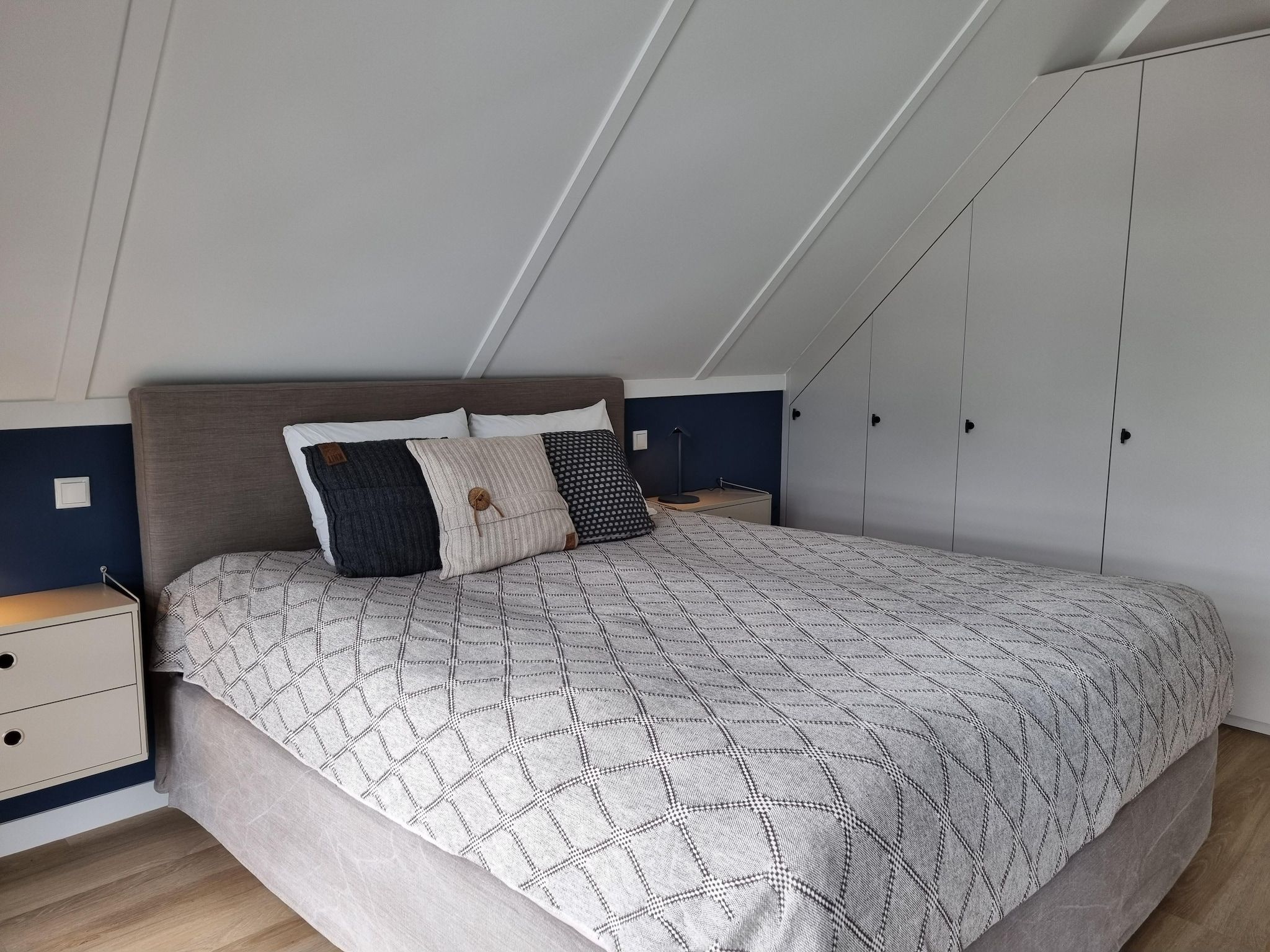 Een slaapkamer van Watervilla Fiiftjin in Balk