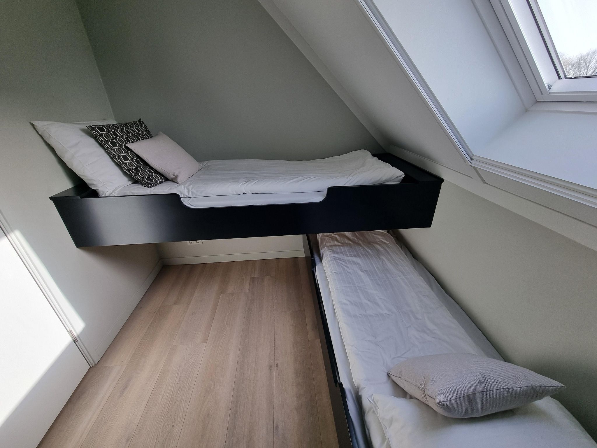 Een slaapkamer van Watervilla Fiiftjin in Balk