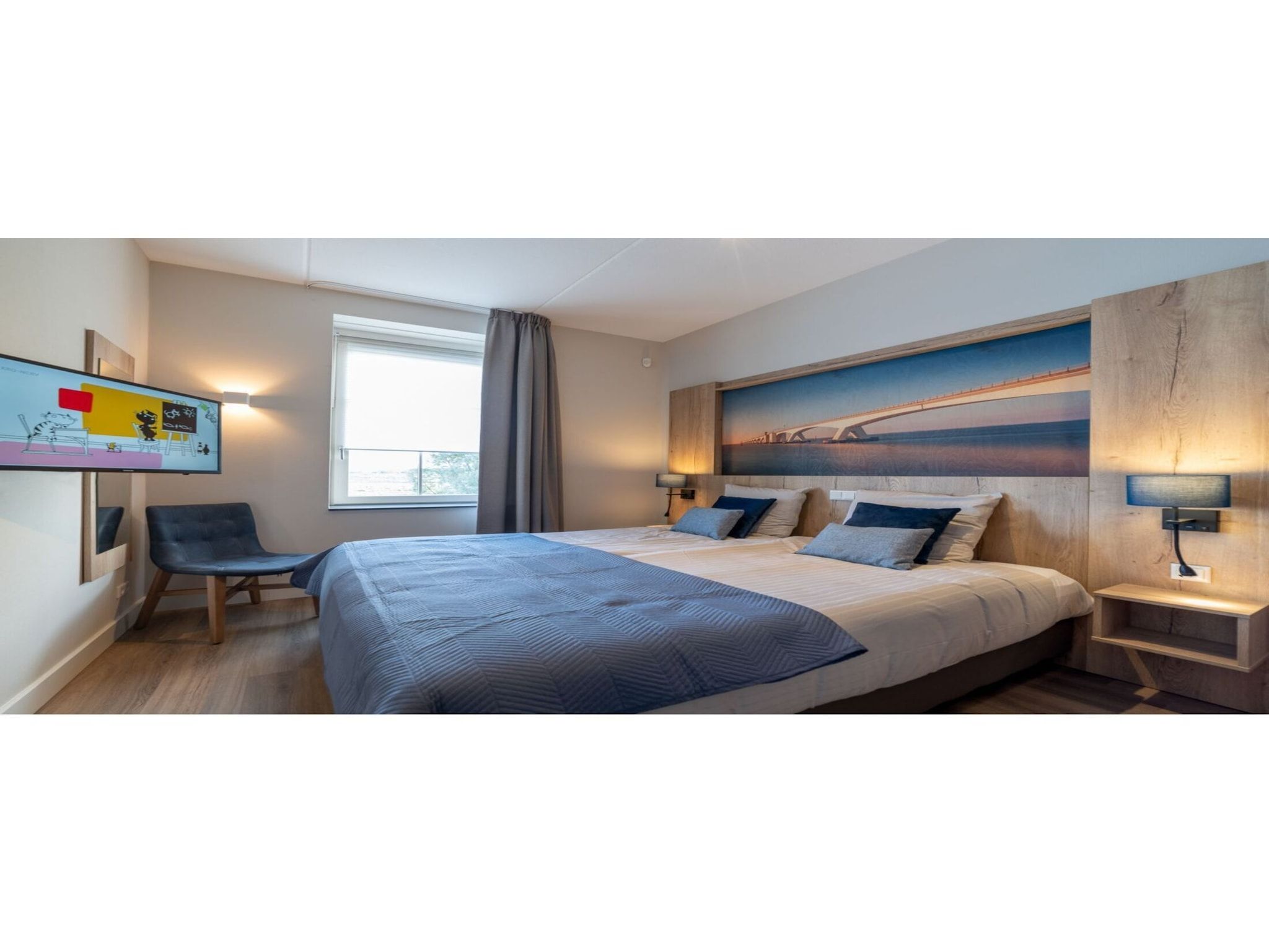 Een slaapkamer van Zeeuwse Parel Appartement 4 pers 1 bdk - 1 in Colijnsplaat