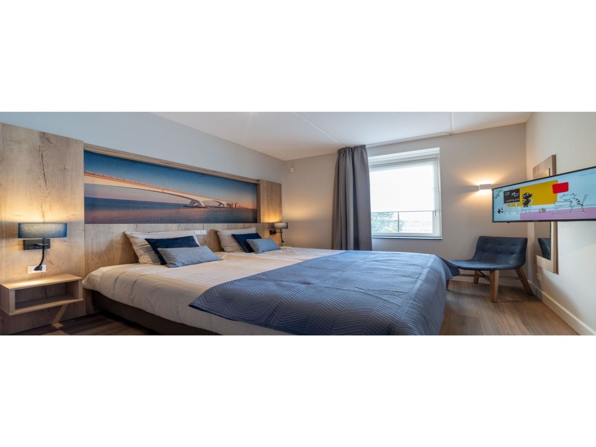 Een slaapkamer van Zeeuwse Parel Appartement 4 pers 1 bdk - 1 in Colijnsplaat