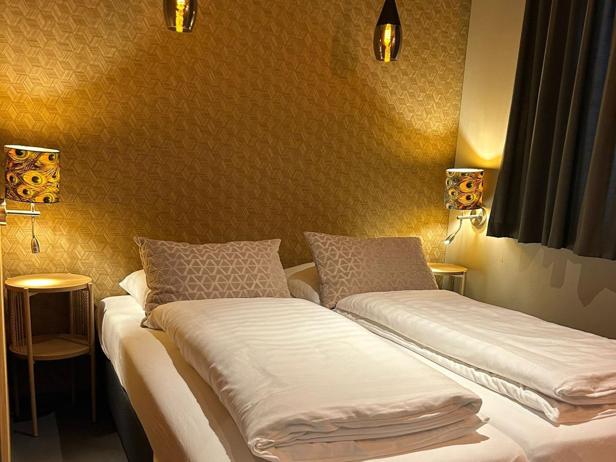 Een slaapkamer van Wellnesslodge Kievit 2p in Dalerveen