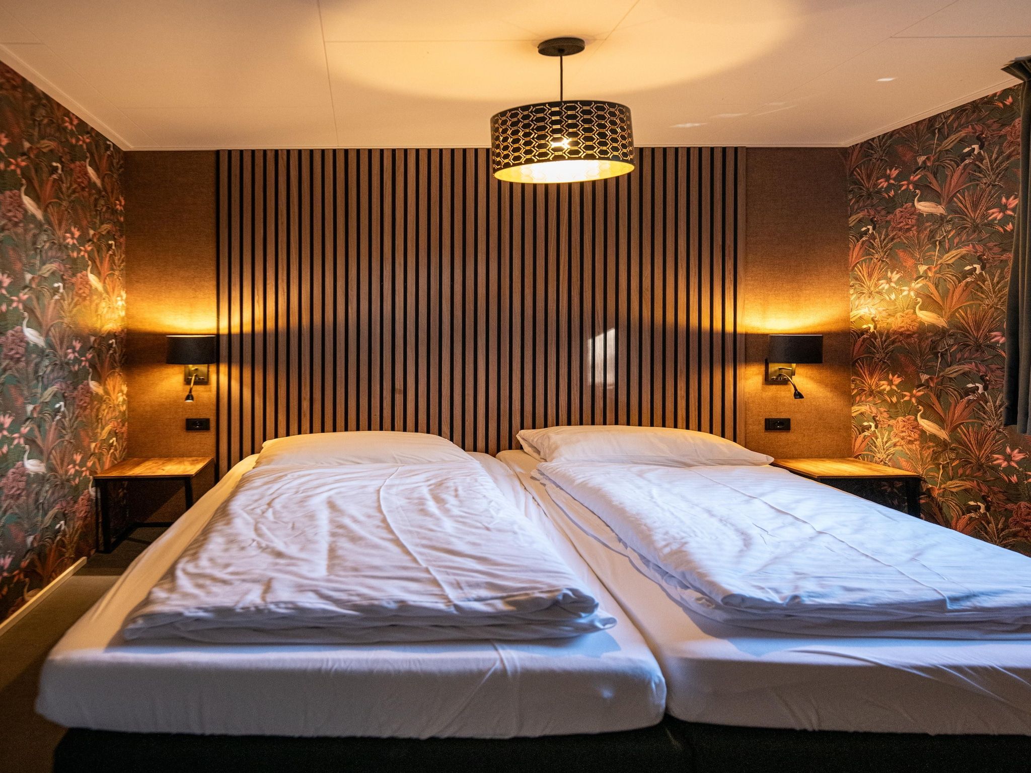 Een slaapkamer van Wellnesslodge Scholekster 4p in Dalerveen