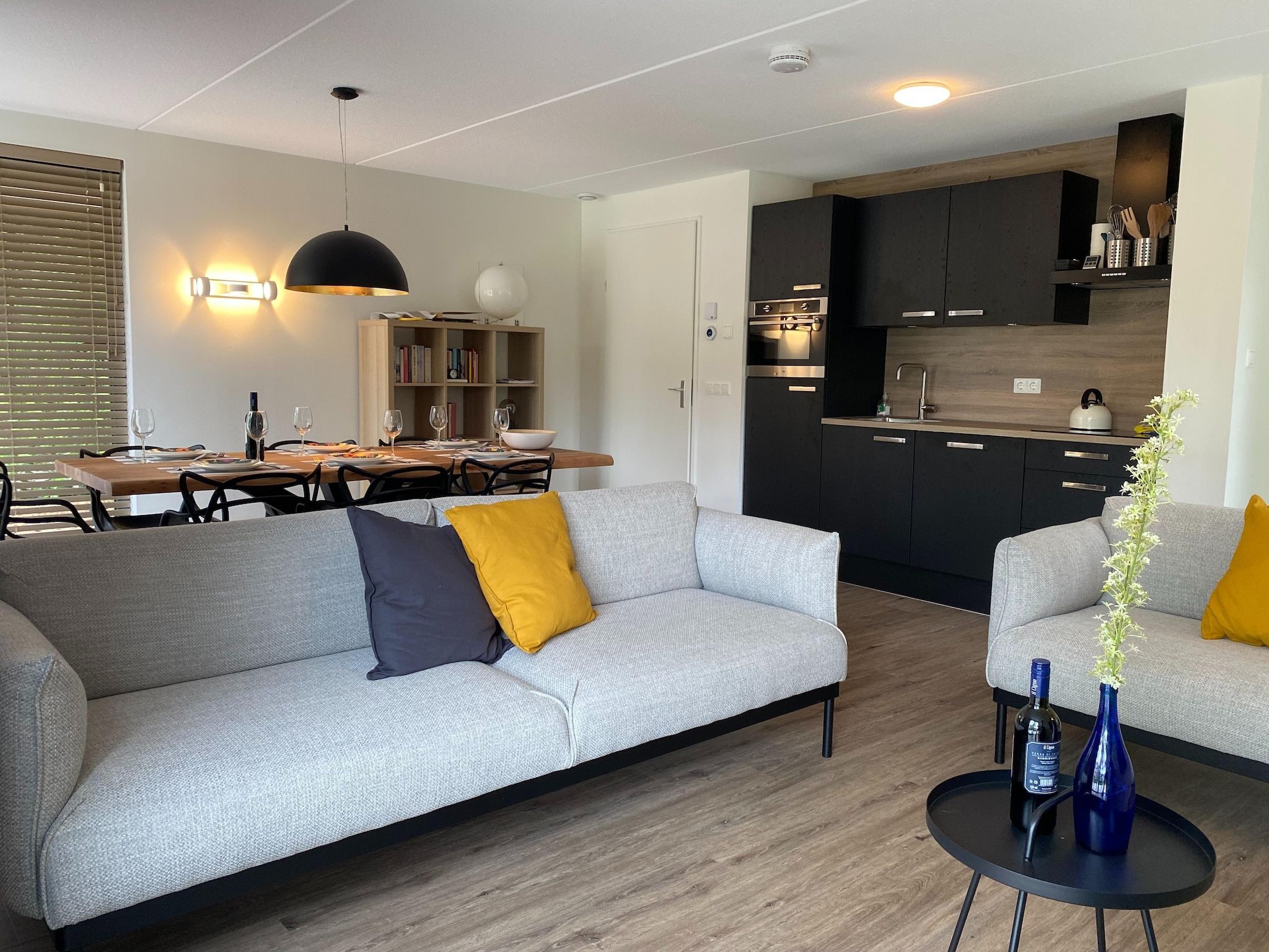 De woonkamer van Energievriendelijk 't Brummelhuus H556 in Lochem