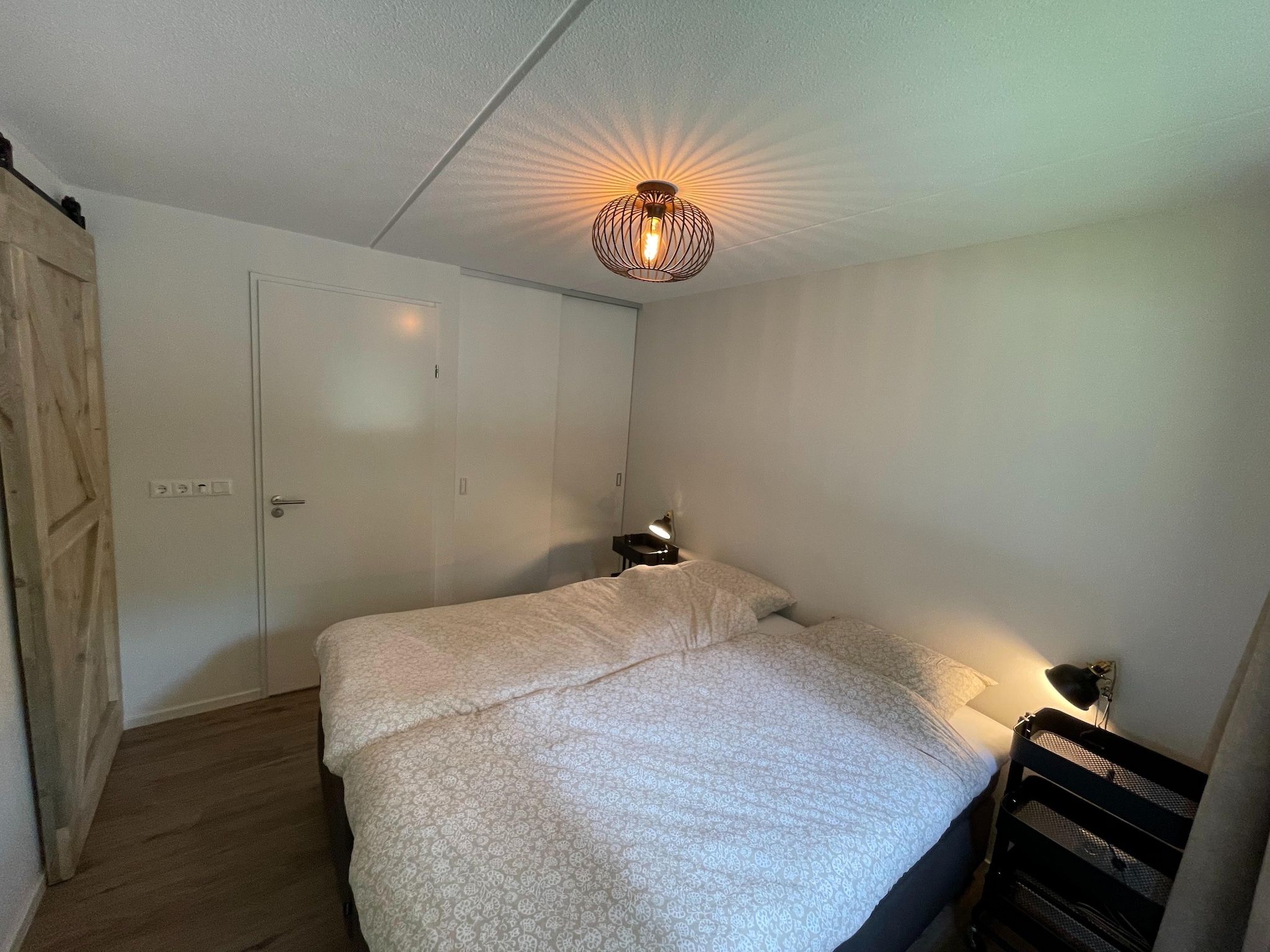 Een slaapkamer van Energievriendelijk 't Brummelhuus H556 in Lochem