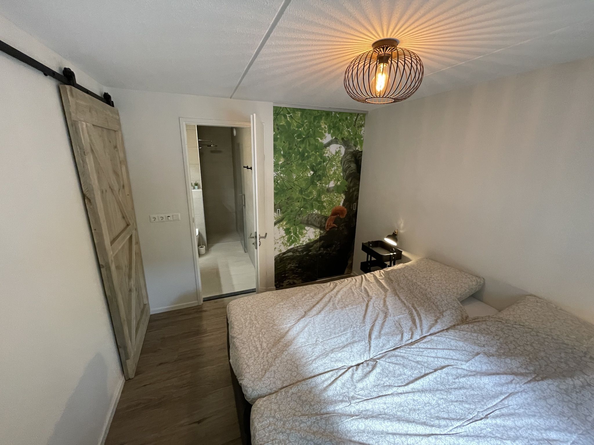 Een slaapkamer van Energievriendelijk 't Brummelhuus H556 in Lochem