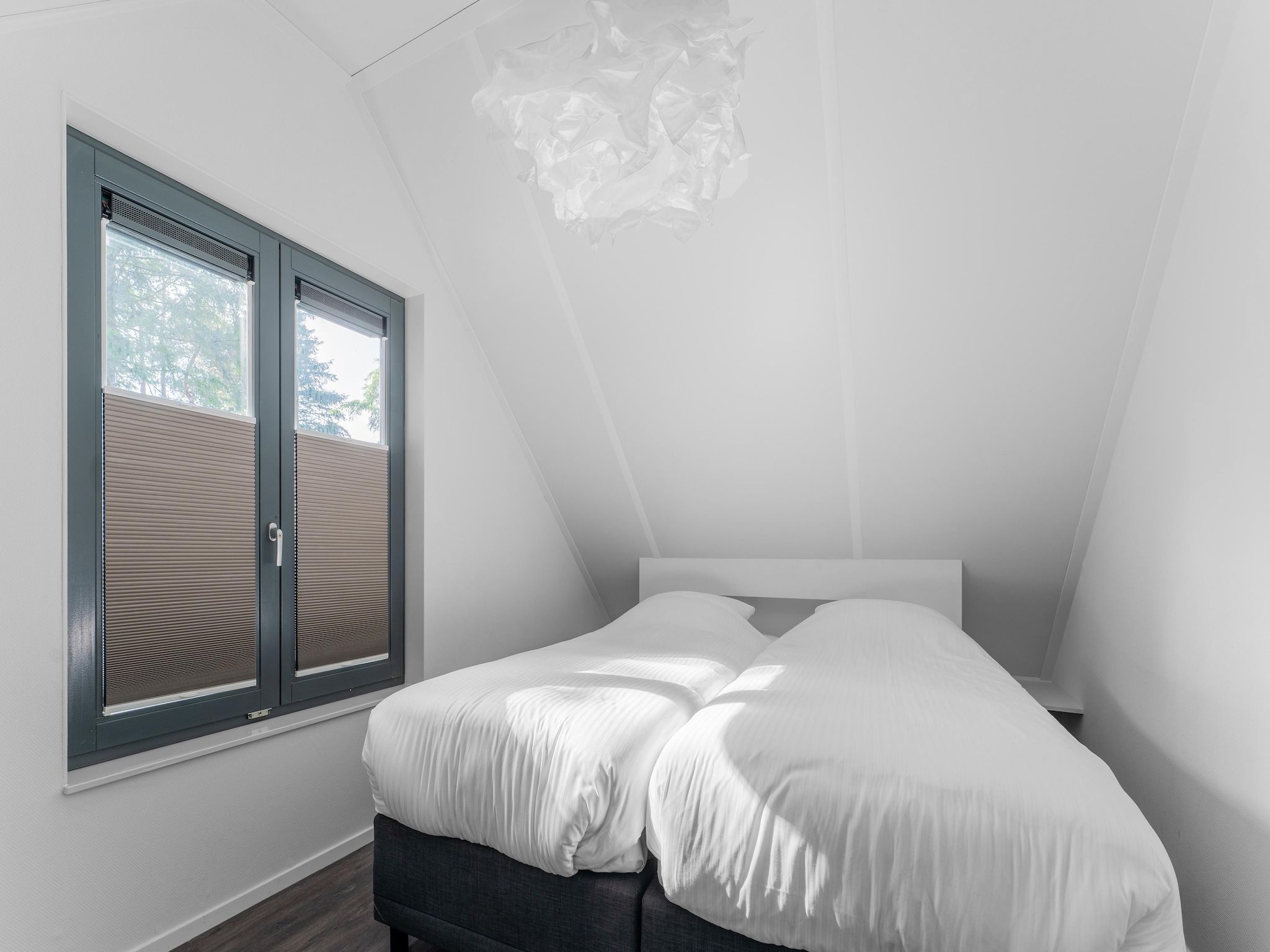 Een slaapkamer van Hart van Ruighenrode - H552 in Lochem