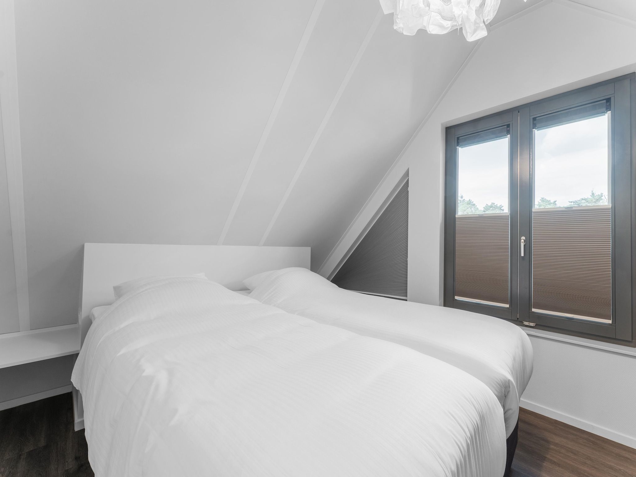 Een slaapkamer van Hart van Ruighenrode - H552 in Lochem