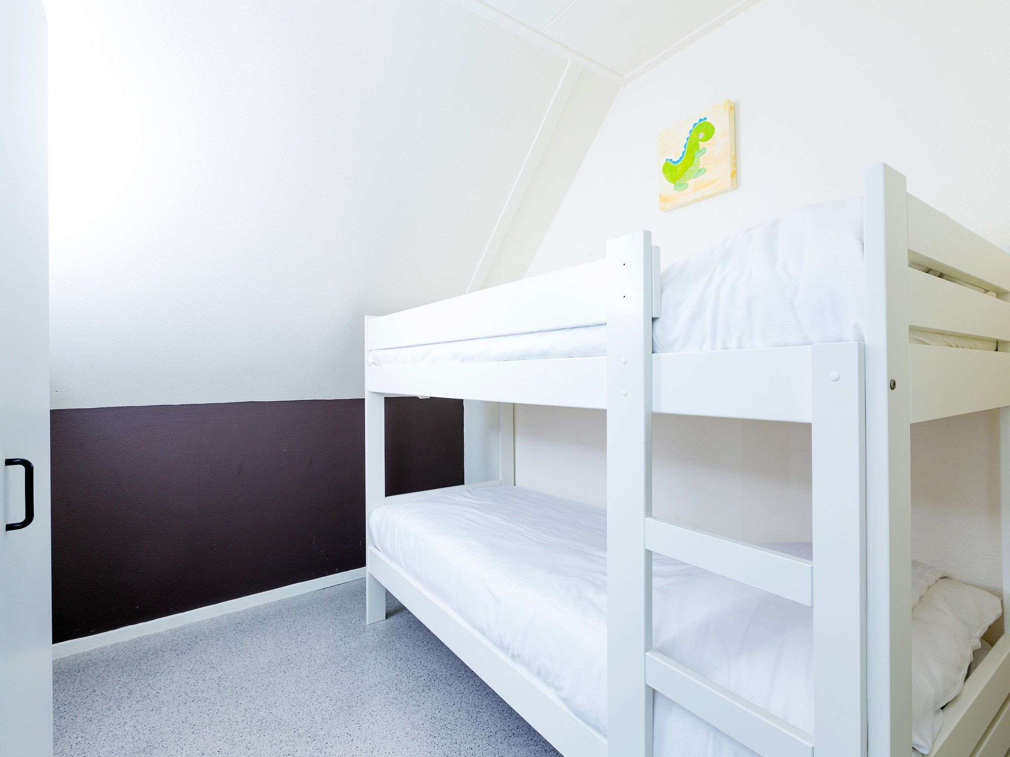 Een slaapkamer van Vakantiepark Hellendoorn 1 in Hellendoorn