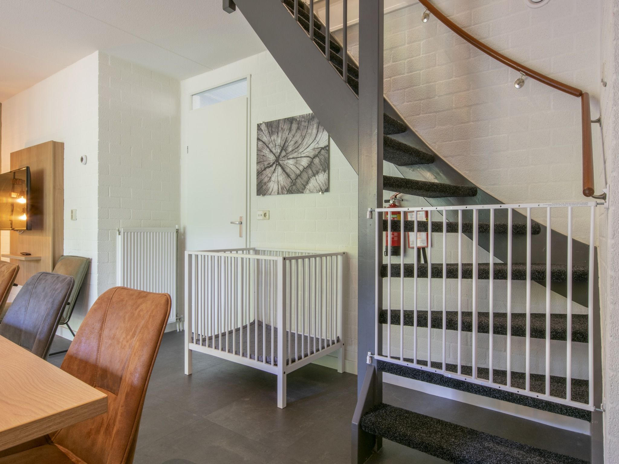 De woonkamer van Vakantiepark de Katjeskelder 23 in Oosterhout