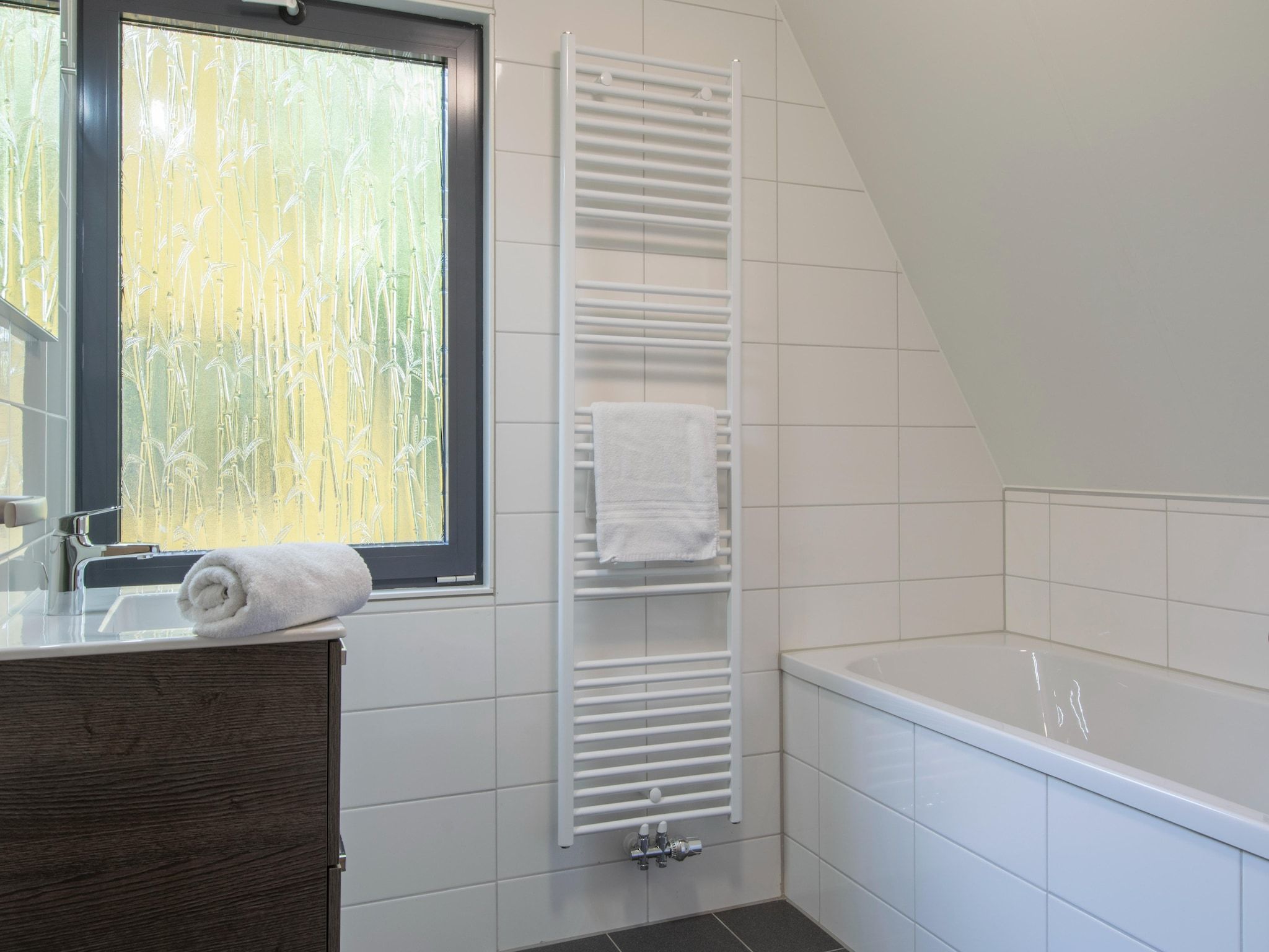 De badkamer van Vakantiepark de Katjeskelder 23 in Oosterhout