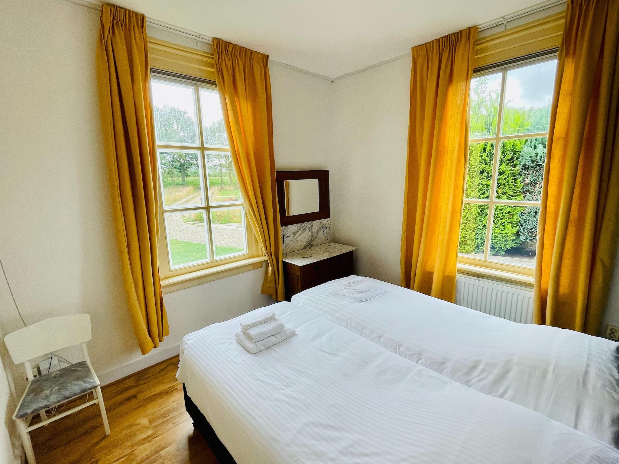 Een slaapkamer van Welskerveen - 4 personen in De Heurne