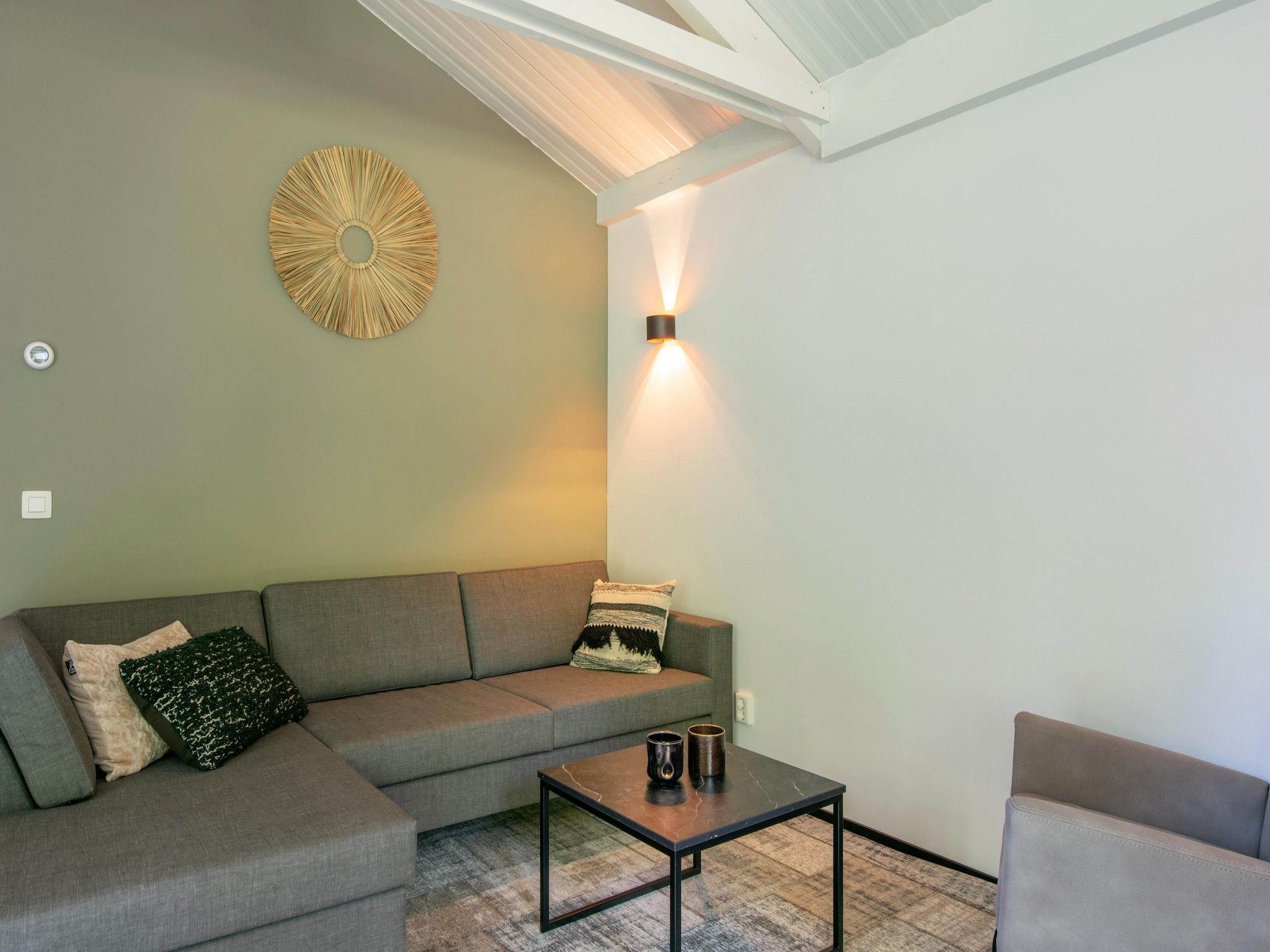 De woonkamer van Bospark 't Wolfsven 15 in Mierlo