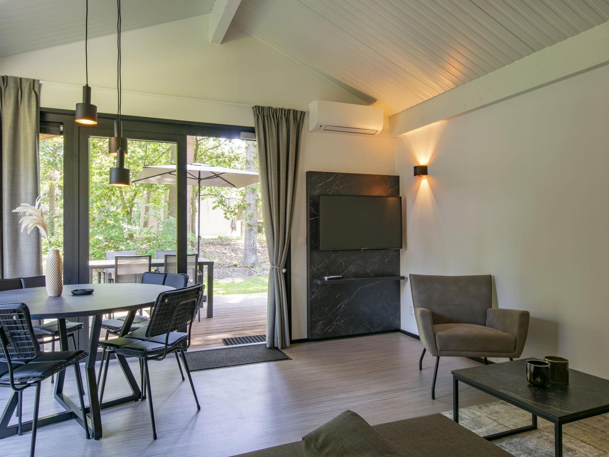 De woonkamer van Bospark 't Wolfsven 15 in Mierlo