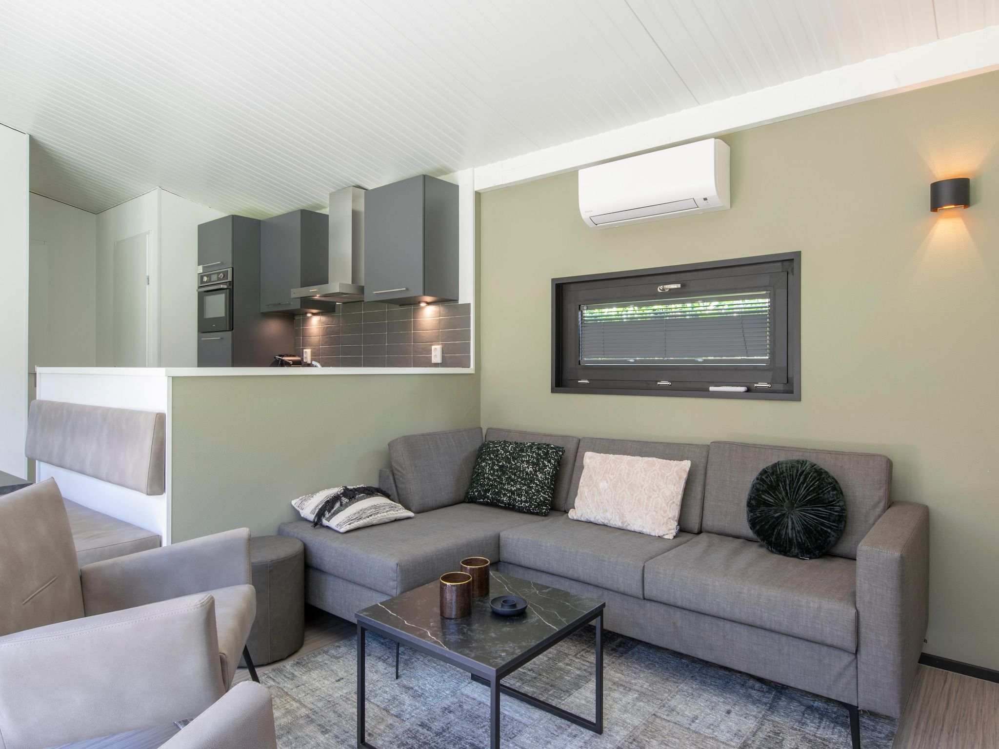 De woonkamer van Bospark 't Wolfsven 16 in Mierlo